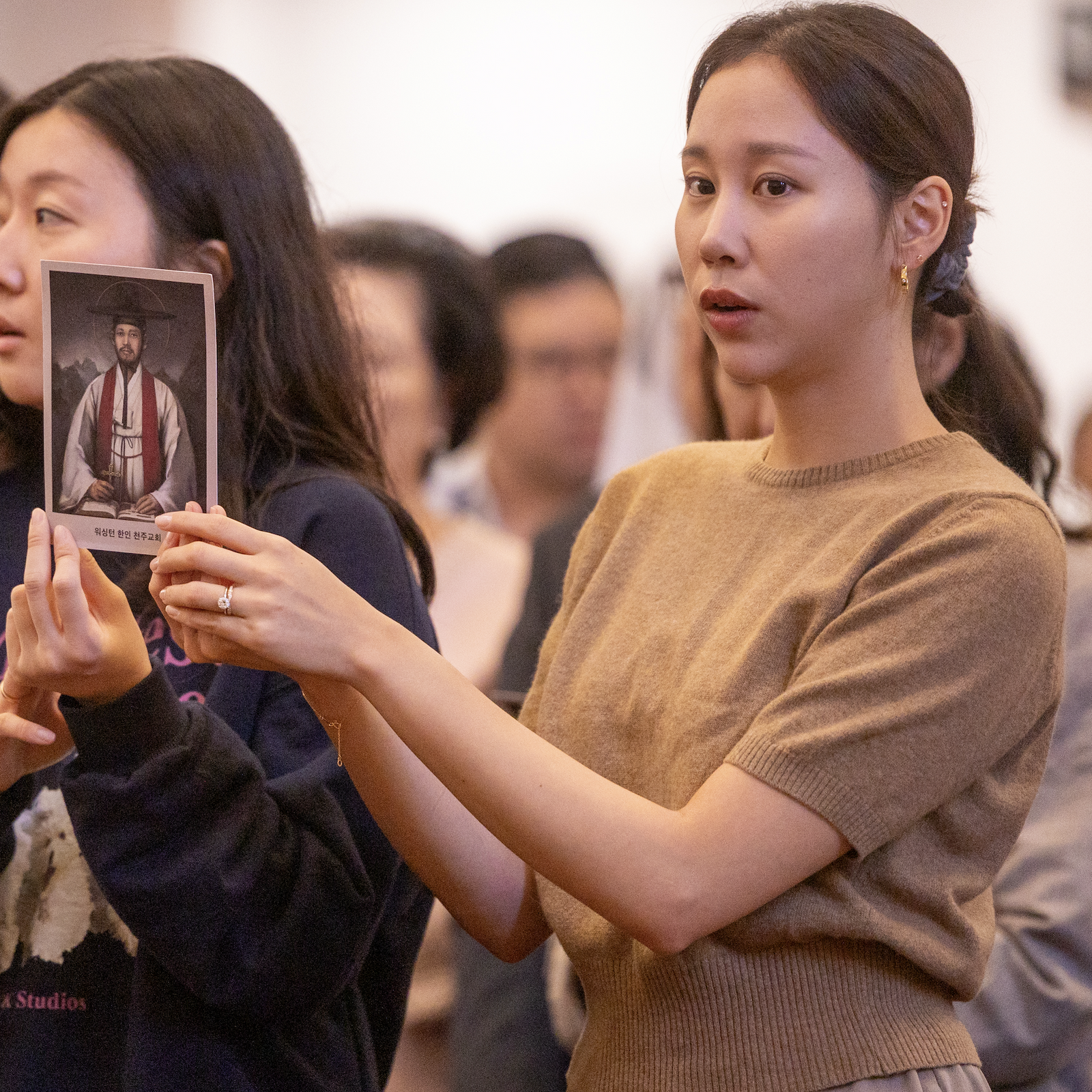 People pray during a Mass on Sept. 29, 2024 marking the 50th anniversary of St. Andrew Kim Parish in Olney, Maryland, that serves Korean Catholics. (Catholic Standard photos by Mihoko Owada)