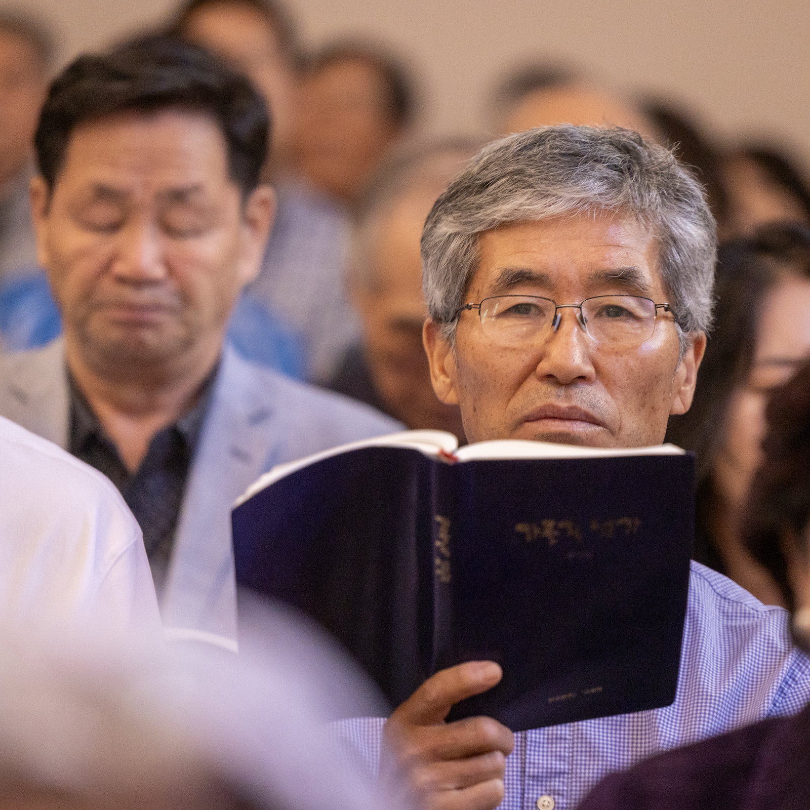 People pray during a Mass on Sept. 29, 2024 marking the 50th anniversary of St. Andrew Kim Parish in Olney, Maryland, that serves Korean Catholics. (Catholic Standard photos by Mihoko Owada)