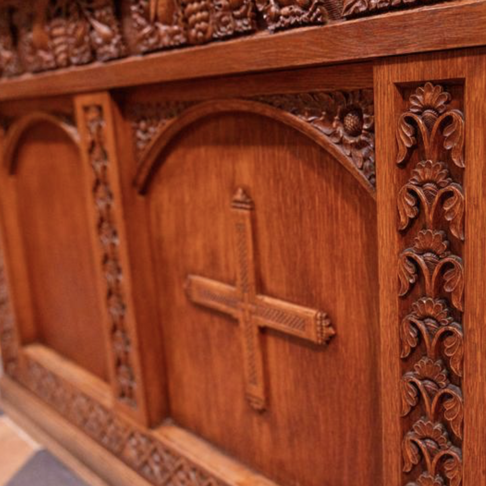 The altar at the chapel of St. Anselm's Abbey in Washington. All of the woodwork was carved by the monks of the abbey. (Catholic Standard photo by Mihoko Owada)