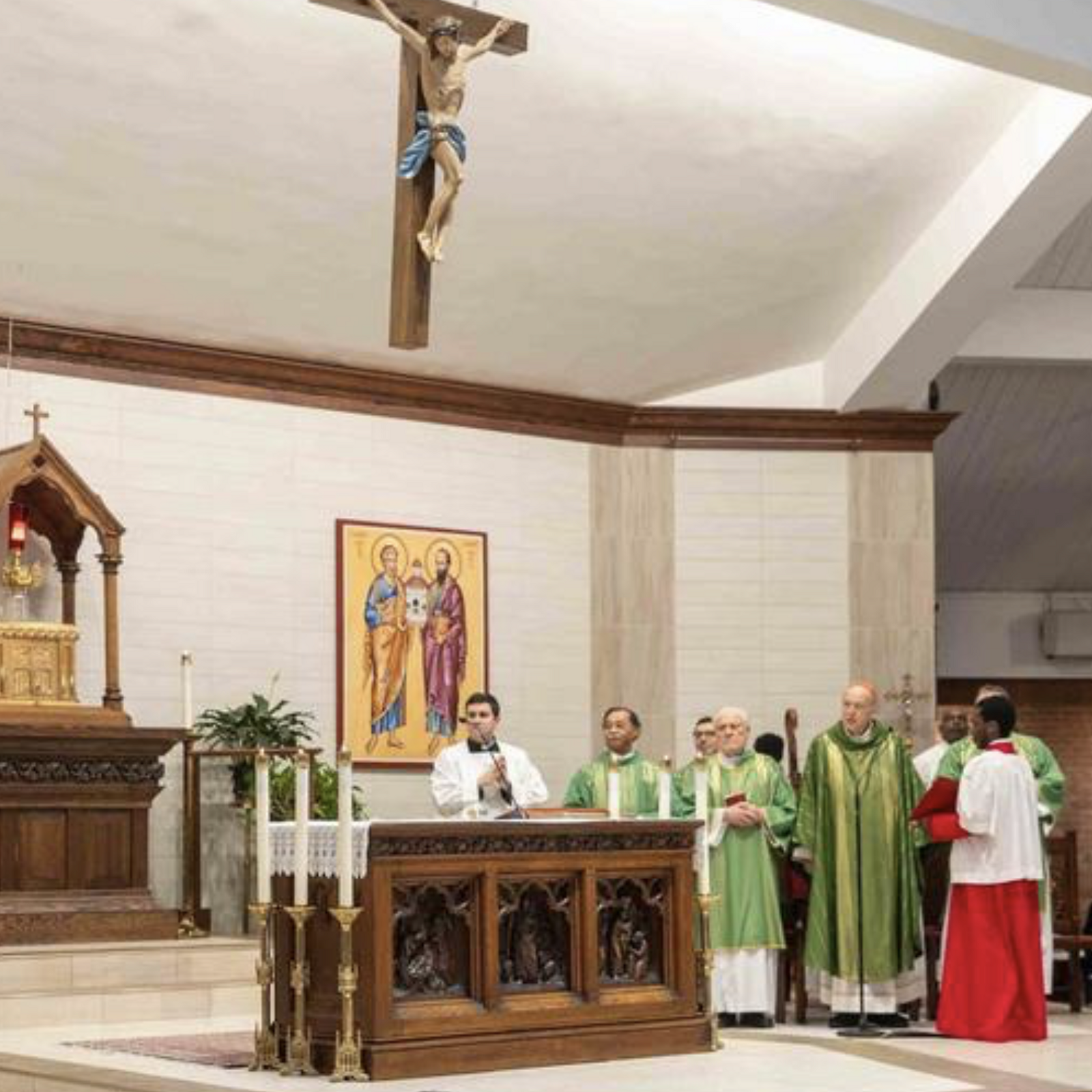 Father Paul Lee (left), pastor of St. Jude Cathedral in Rockville, Maryland, welcomes Washington Cardinal Robert W. McElroy and Washington Auxiliary Bishop Roy E. Campbell Jr. and all attendees at the beginning of a Mass honoring the legacy of Rev. Martin Luther King Jr. on January 18 (Catholic Standard photo by Mihoko Owada)