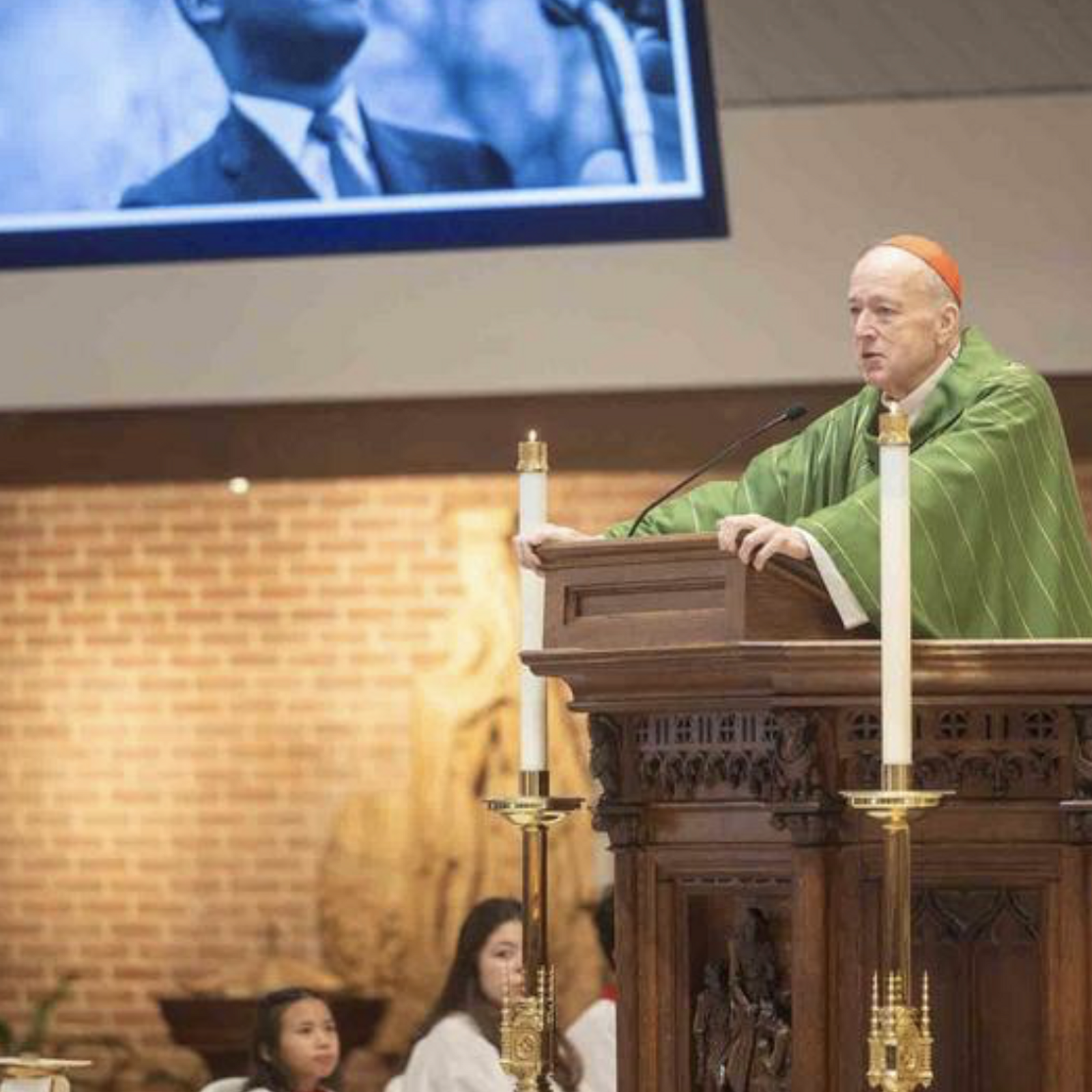 Washington Cardinal Robert W. McElroy speaks during a Jan. 18 Mass at Shrine of St. Jude Catholic Church in Rockville, Maryland that was offered in remembrance of the legacy of the Rev. Dr. Martin Luther King Jr. A portrait of the late civil rights leader was displayed as Cardinal Gregory said Dr. King led a “revolution of conscience” seeking “the conversion of hearts.” (Catholic Standard photo by Mihoko Owada)