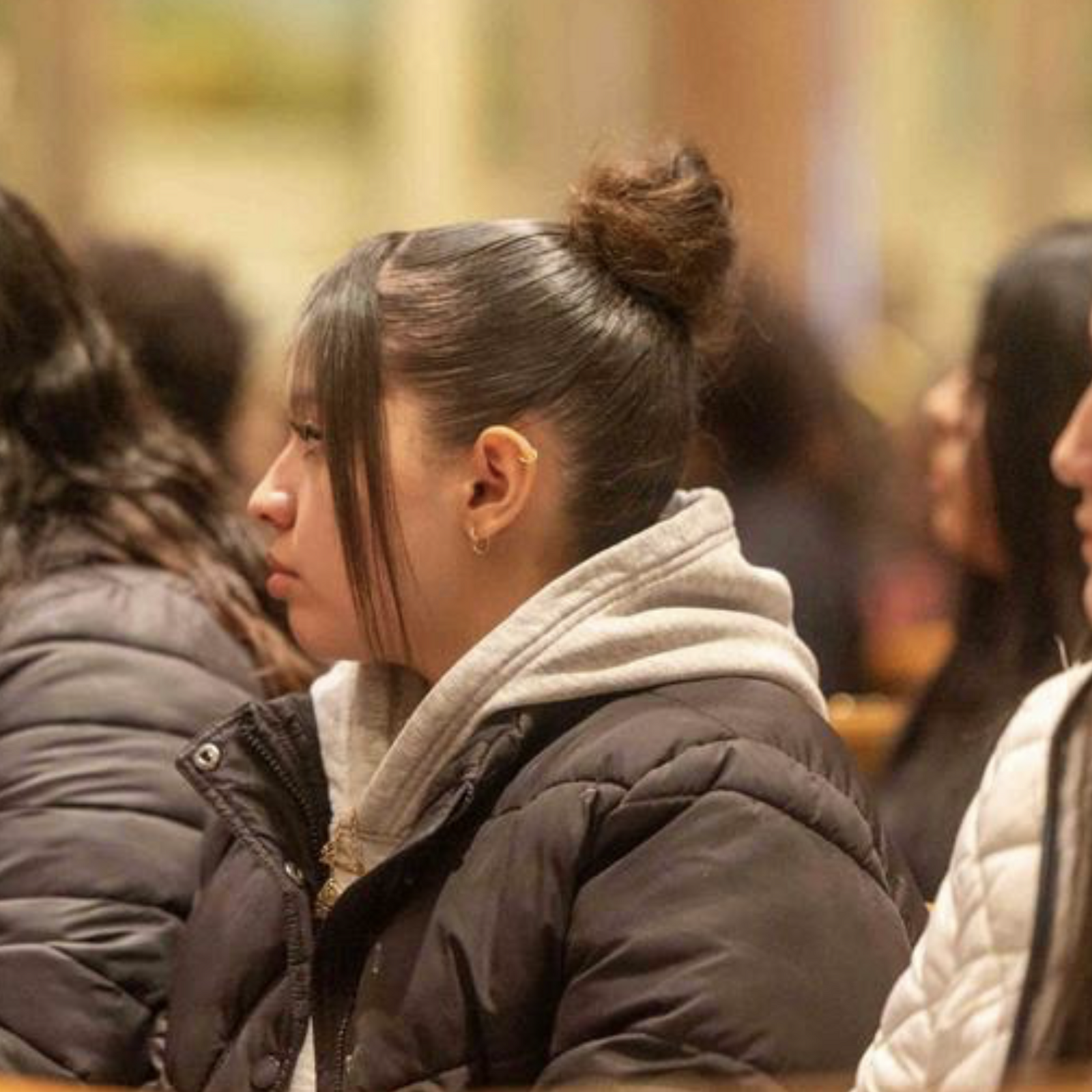 Young people listen to the homily during the annual Youth Mass for Life on Jan. 23 at the Cathedral of St. Matthew the Apostle in Washington. The Mass was held prior to the annual national March for Life. (Catholic Standard photos by Mihoko Owada)
