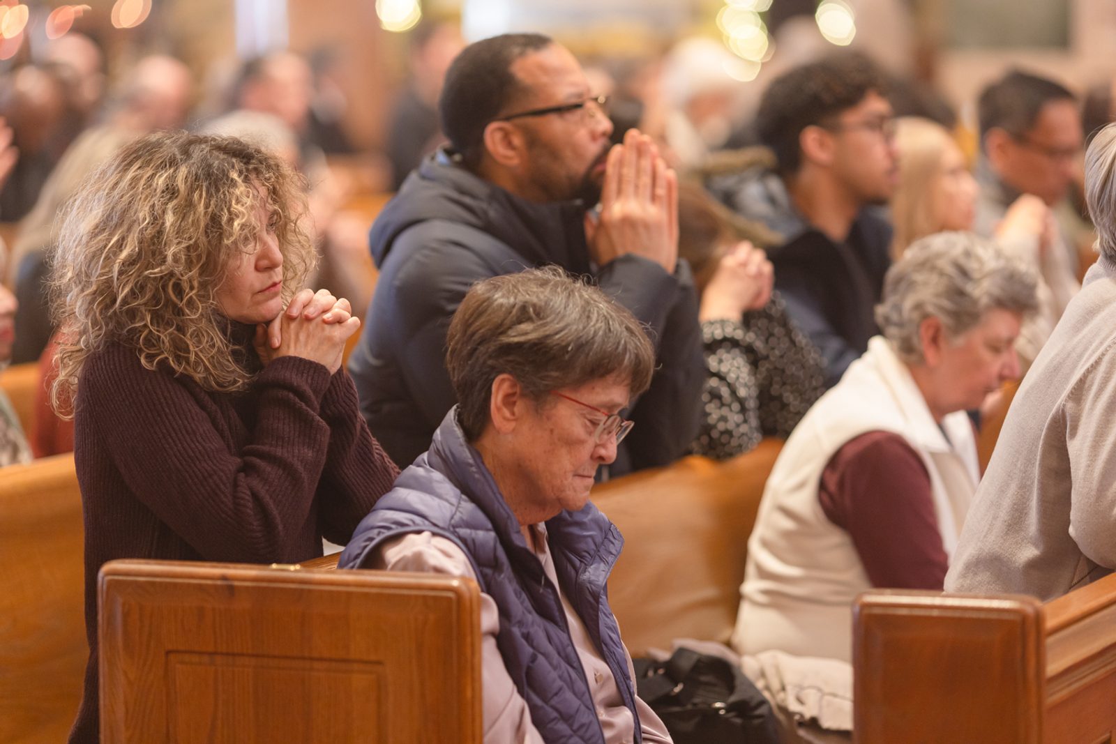People pray during a Mass for the Solemnity of the Blessed Virgin Mary, the Mother of God, and for the Opening of the Jubilee Year on Jan. 1, 2025 at the Cathedral of St. Matthew the Apostle in Washington, D.C. (Catholic Standard photos by Rachel Lincoln)
