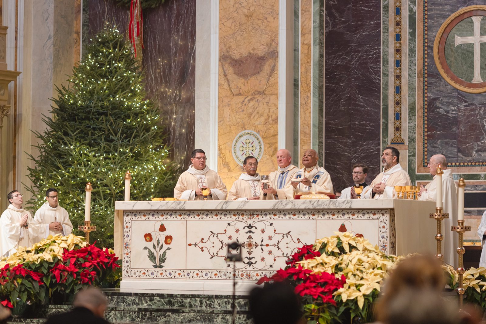 Cardinal Wilton Gregory at center celebrates the Opening of the Jubilee Year Mass on Jan. 1, 2025 at the Cathedral of St. Matthew the Apostle in Washington, D.C. The Mass also marked the Solemnity of the Blessed Virgin Mary, the Mother of God. Standing at the altar from left to right are Washington Auxiliary Bishop Evelio Menjivar, Washington Auxiliary Bishop Roy Campbell Jr., Cardinal Gregory, Washington Auxiliary Bishop Juan Esposito and Msgr. W. Ronald Jameson, the cathedral’s rector. (Catholic Standard photo by Rachel Lincoln)