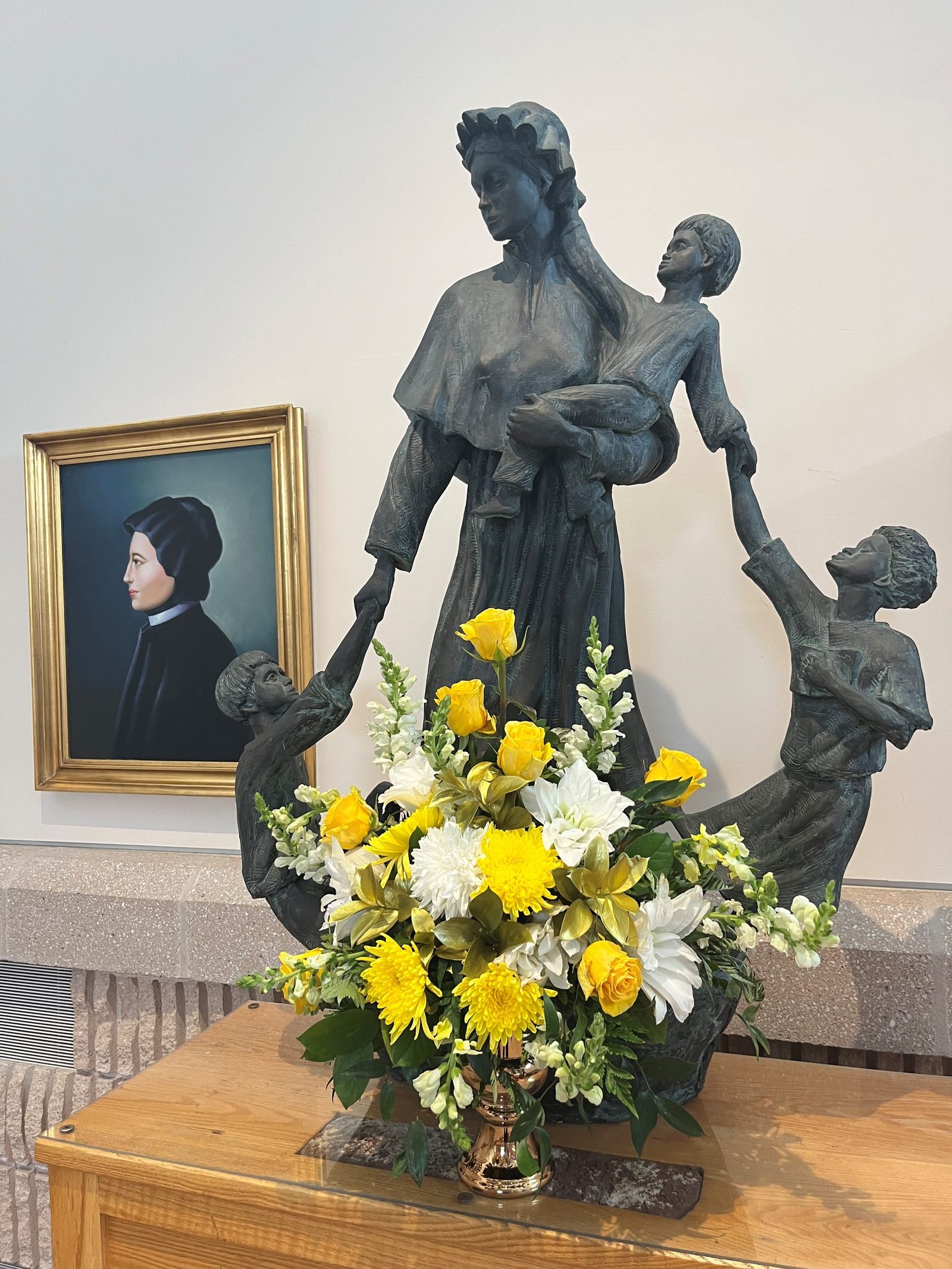 The patron saint of Mother Seton Parish in Germantown, St. Elizabeth Ann Seton, is depicted in a statue in the church done by artist Timothy Schmalz. (Catholic Standard photo by Mark Zimmermann)