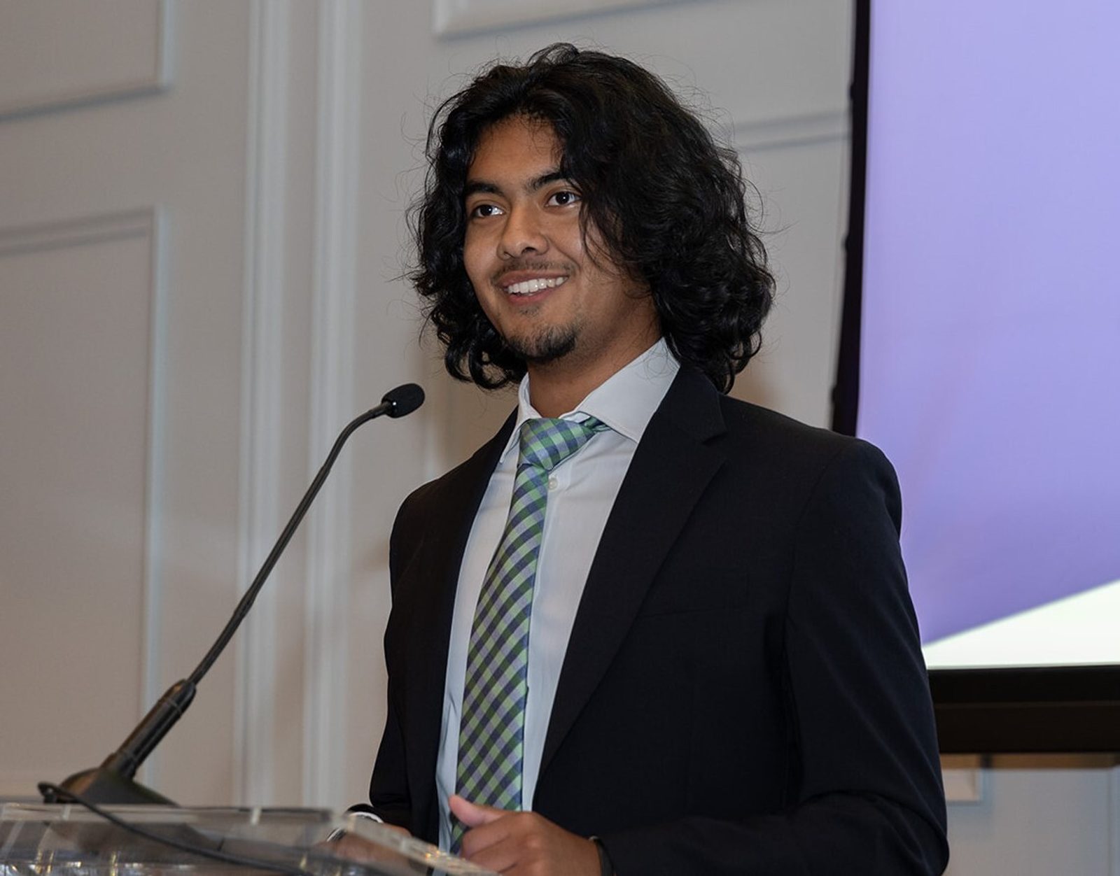 Joseu Ochaita, a graduate of San Miguel School in Washington who is attending George Washington University, speaks at the 10th annual gala of the Catholic Business Network of Washington, D.C., held at the Four Seasons Hotel on Oct. 10, 2024. (Photo courtesy of CBN-D.C. by Michael J. Collela)