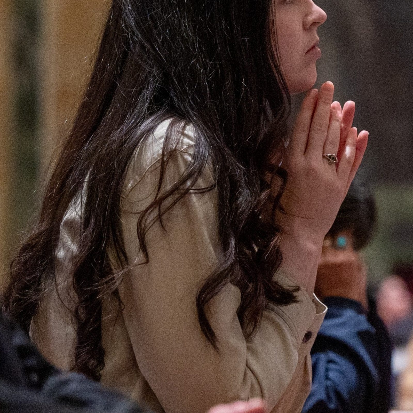 A woman prays during a Holy Thursday Mass on April 17, 2025 at the Cathedral of St. Matthew the Apostle in Washington, D.C. (Catholic Standard photo by Mihoko Owada)