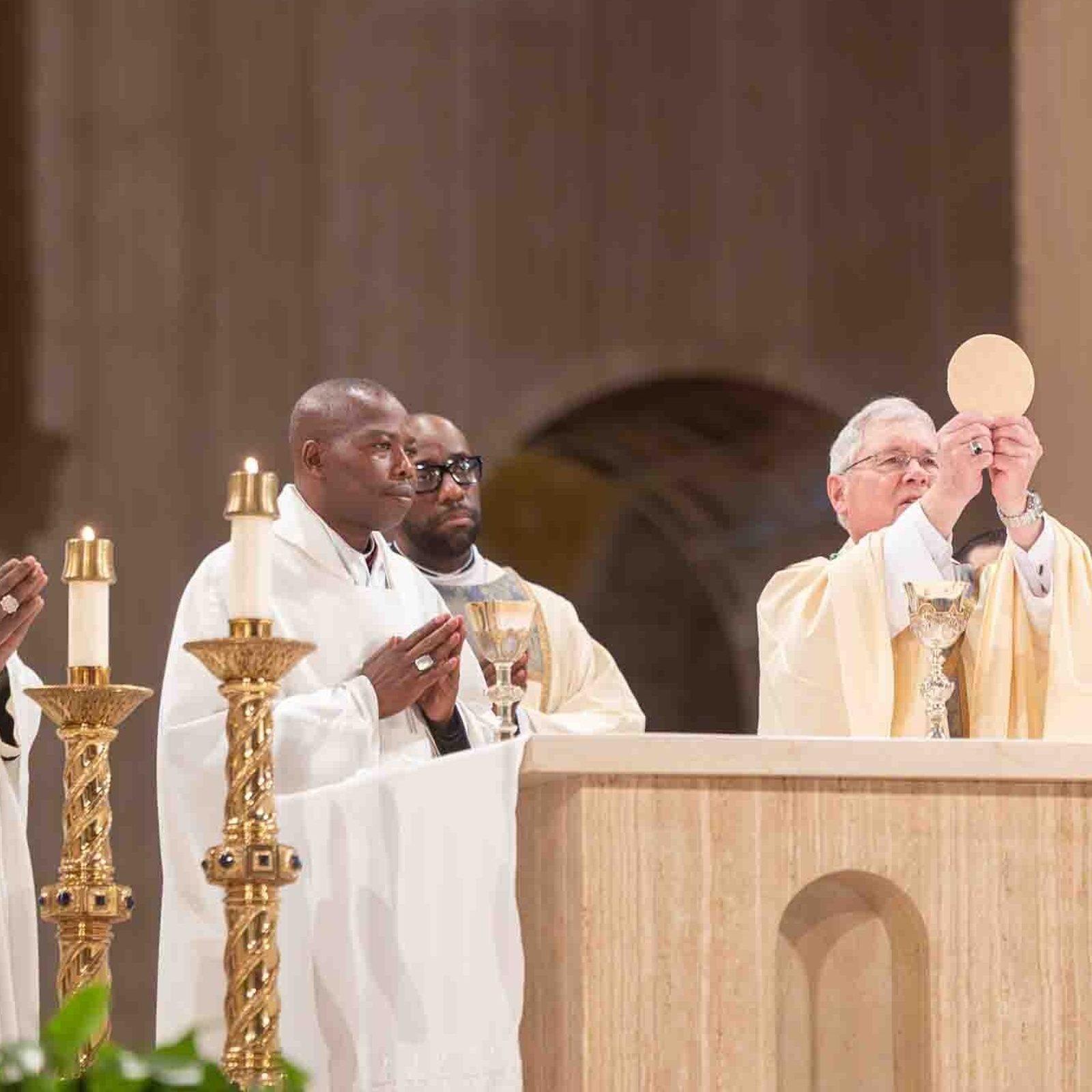 Bishop David J. Malloy of Rockford, Illinois (at center), elevates the Eucharist during a Mass for Solidarity with the Bishops and Faithful of Africa on Feb. 4, 2026 at the Basilica of the National Shrine of the Immaculate Conception in Washington. Bishop Malloy was the main celebrant of the Mass that was concelebrated by bishops representing the United States Conference of Catholic Bishops’ Committee on International Justice and Peace and the Symposium of Episcopal Conferences of Africa and Madagascar. From left to right are Bishop Jerome Feudjio of St. Thomas in the Virgin Islands; Bishop Stephen Dami Mamza of the Diocese of Yola in Nigeria who was the homilist at the Mass and serves as the first vice president of SECAM; Deacon Yannick Allepot who assisted at the Mass; Bishop Malloy; Bishop Abdallah Elias Zaidan of the Maronite Eparchy of Our Lady of Lebanon of Los Angeles who serves as the chairman of that USCCB committee; and Washington Auxiliary Bishop Evelio Menjivar. (Catholic Standard photo by Mihoko Owada)