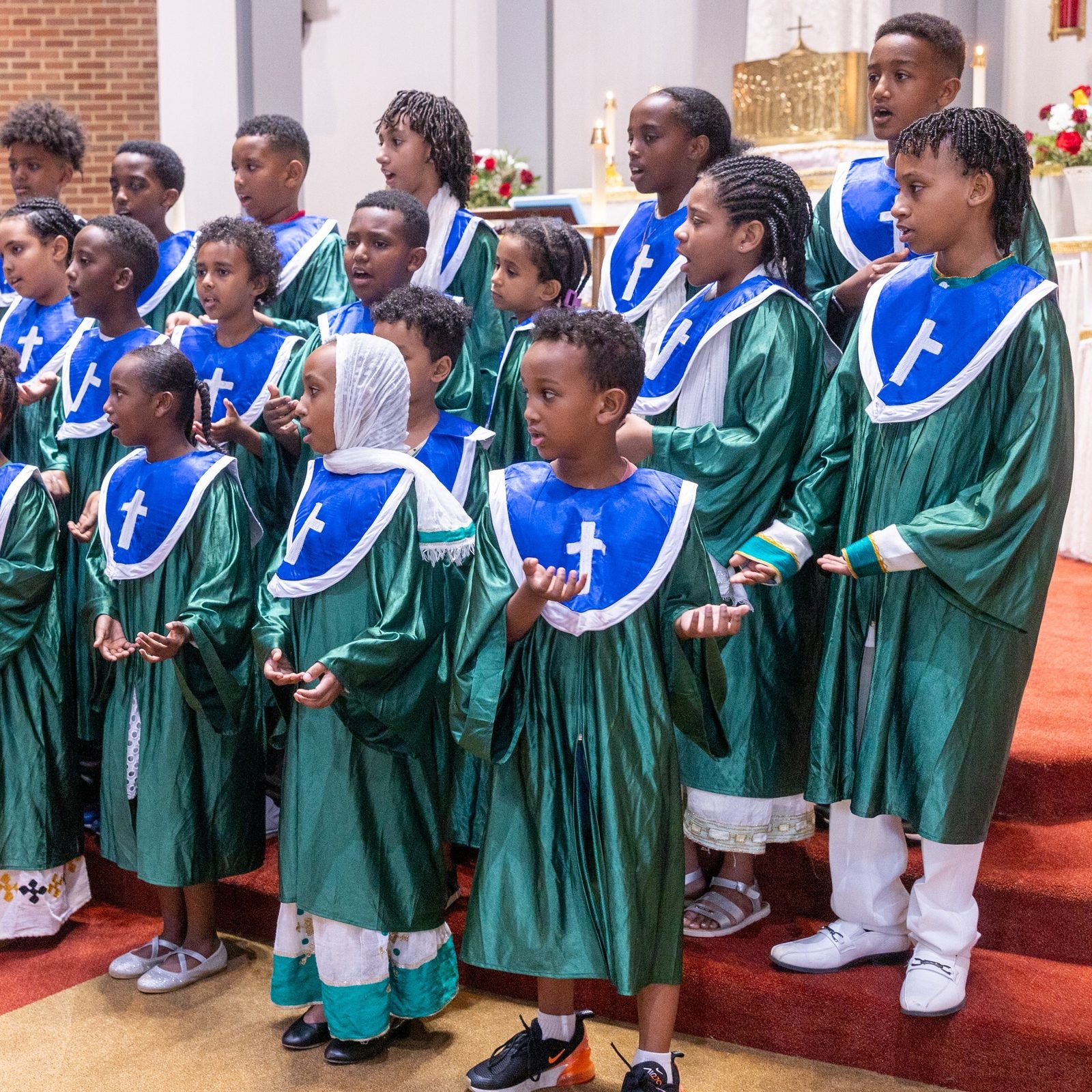 Children’s choir members of Kidane-Mehret Parish for Ethiopian Catholics sing during a Mass on Aug. 24, 2025 at Holy Spirit Church in Forestville, Maryland, their new parish home. (Catholic Standard photo by Mihoko Owada)