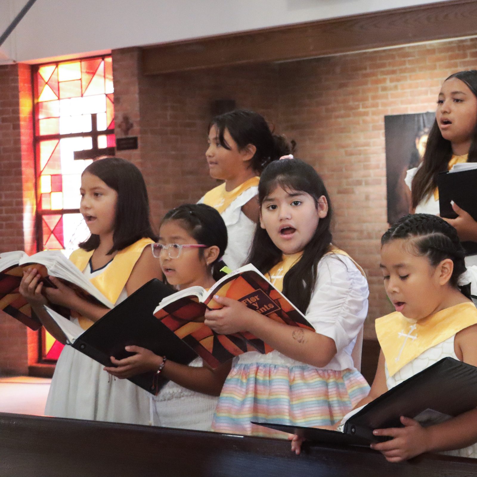 Girls sing in a choir during an Aug. 18 Mass at the Shrine of St. Jude in Rockville, Maryland. (Catholic Standard photo by Javier Diaz)