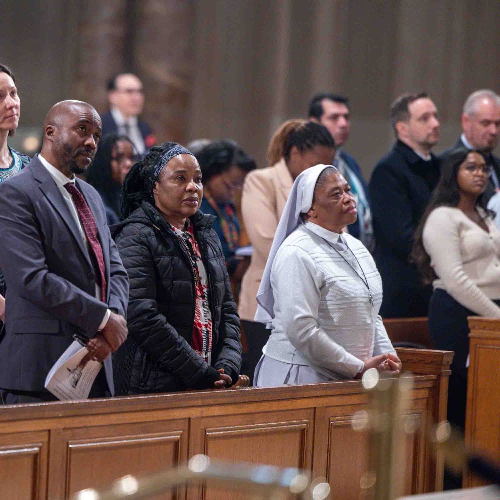 People participate in and pray during a Mass for Solidarity with the Bishops and Faithful of Africa on Feb. 4, 2026 at the Basilica of the National Shrine of the Immaculate Conception in Washington. The Mass for Solidarity was celebrated by bishops representing the United States Conference of Catholic Bishops’ Committee on International Justice and Peace and the Symposium of Episcopal Conferences of Africa and Madagascar. The liturgy followed a joint statement, “Brothers and Sisters in Hope,” issued by the USCCB and SECAM on Feb. 2. (Catholic Standard photos by Mihoko Owada)