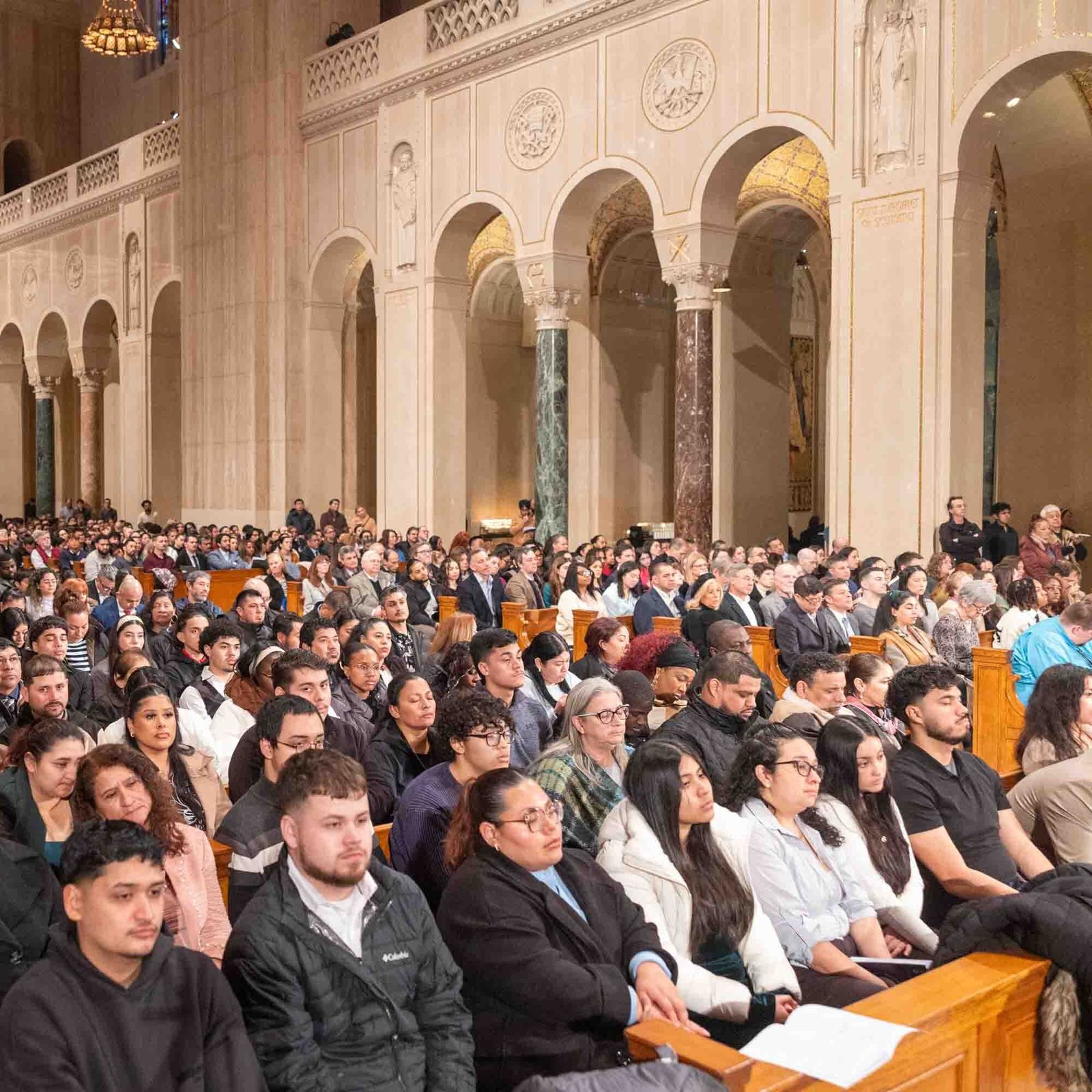 The Basilica of the National Shrine of the Immaculate Conception – the largest Catholic Church in North America – was filled for the Rite of Election and Call to Continuing Conversion on Feb. 22, 2026. The catechumens and candidates in attendance that day are among 1,755 people from throughout the Roman Catholic Archdiocese of Washington who are preparing to be fully received into the Catholic Church at the Easter Vigil this year, which is the largest number of people becoming full members of the Catholic Church in the archdiocese in the last 15 years. (Catholic Standard photo by Mihoko Owada)