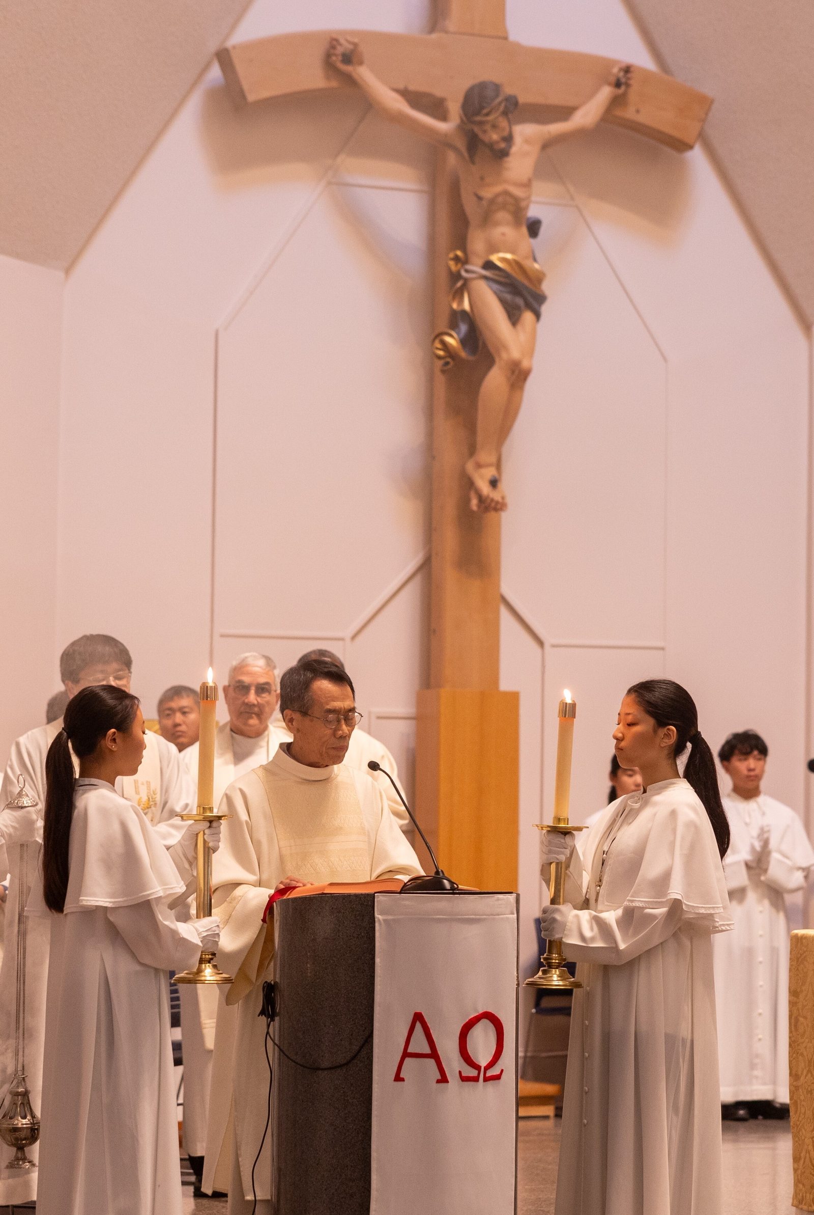Deacon Chang Choi reads the Gospel during a Mass on Sept. 29, 2024 for the 50th anniversary of St. Andrew Kim Parish in Olney, Maryland. St. Andrew Kim is the home parish of Deacon Choi, who now serves at nearby St. Peter Parish in Olney. (Catholic Standard photo by Mihoko Owada)