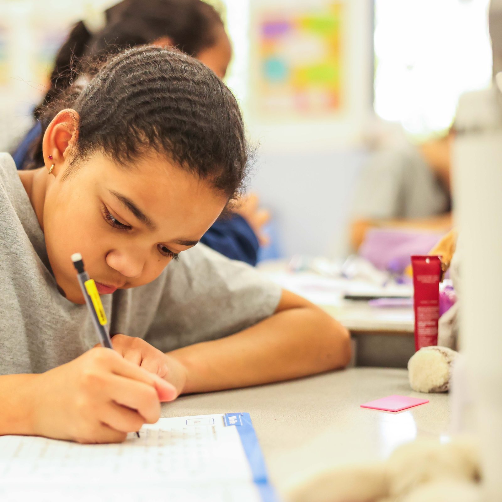 Fifth grader Imani Castillo works on a classroom exercise at St. Martin of Tours School in Gaithersburg, Maryland. (Catholic Standard photo by Andrew Biraj)