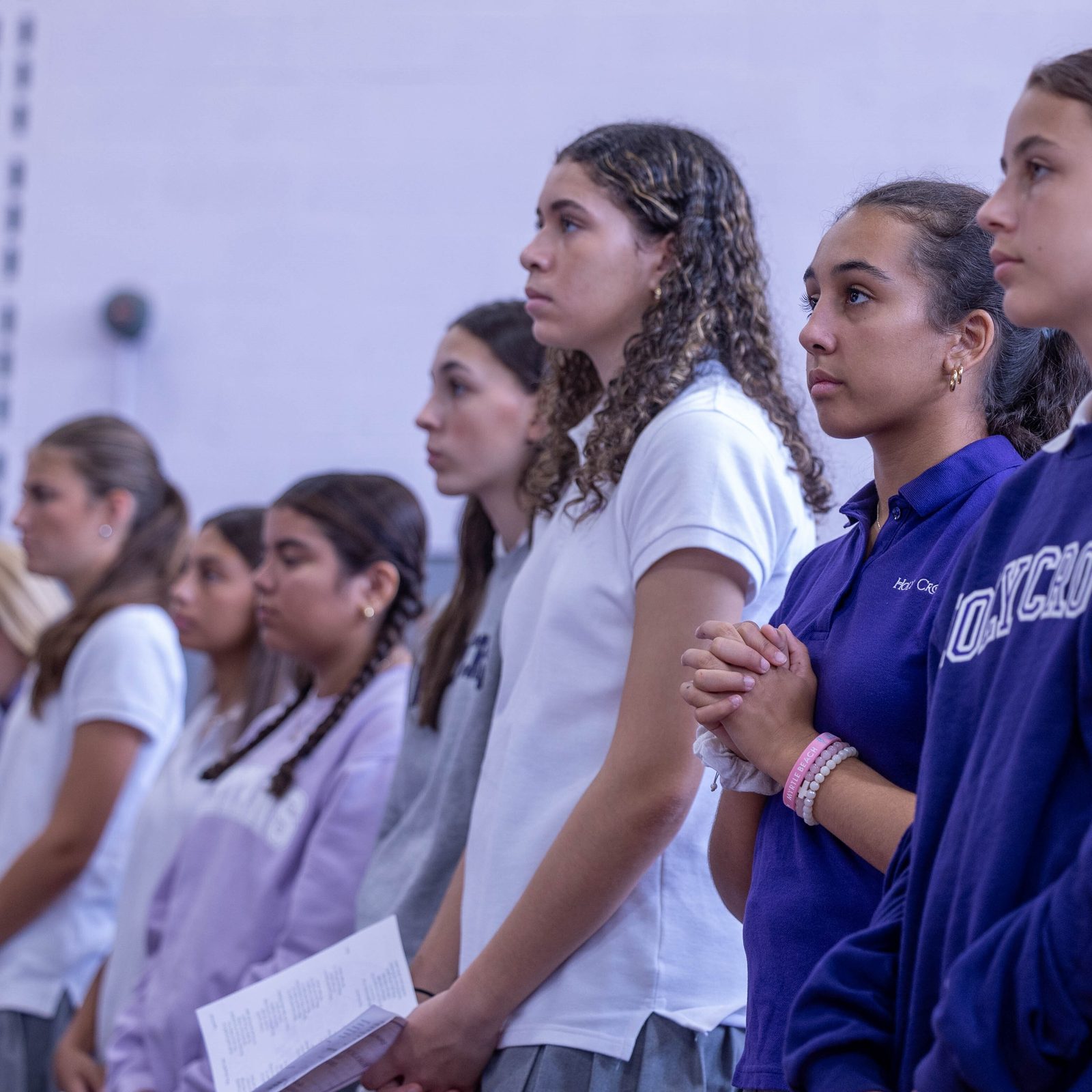 Students at The Academy of the Holy Cross in Kensington, Maryland, pray during a school-wide Mass celebrated by Washington Cardinal Wilton Gregory on Sept. 13, 2024 to mark the Feast of the Exaltation of the Holy Cross. (Catholic Standard photo by Mihoko Owada)