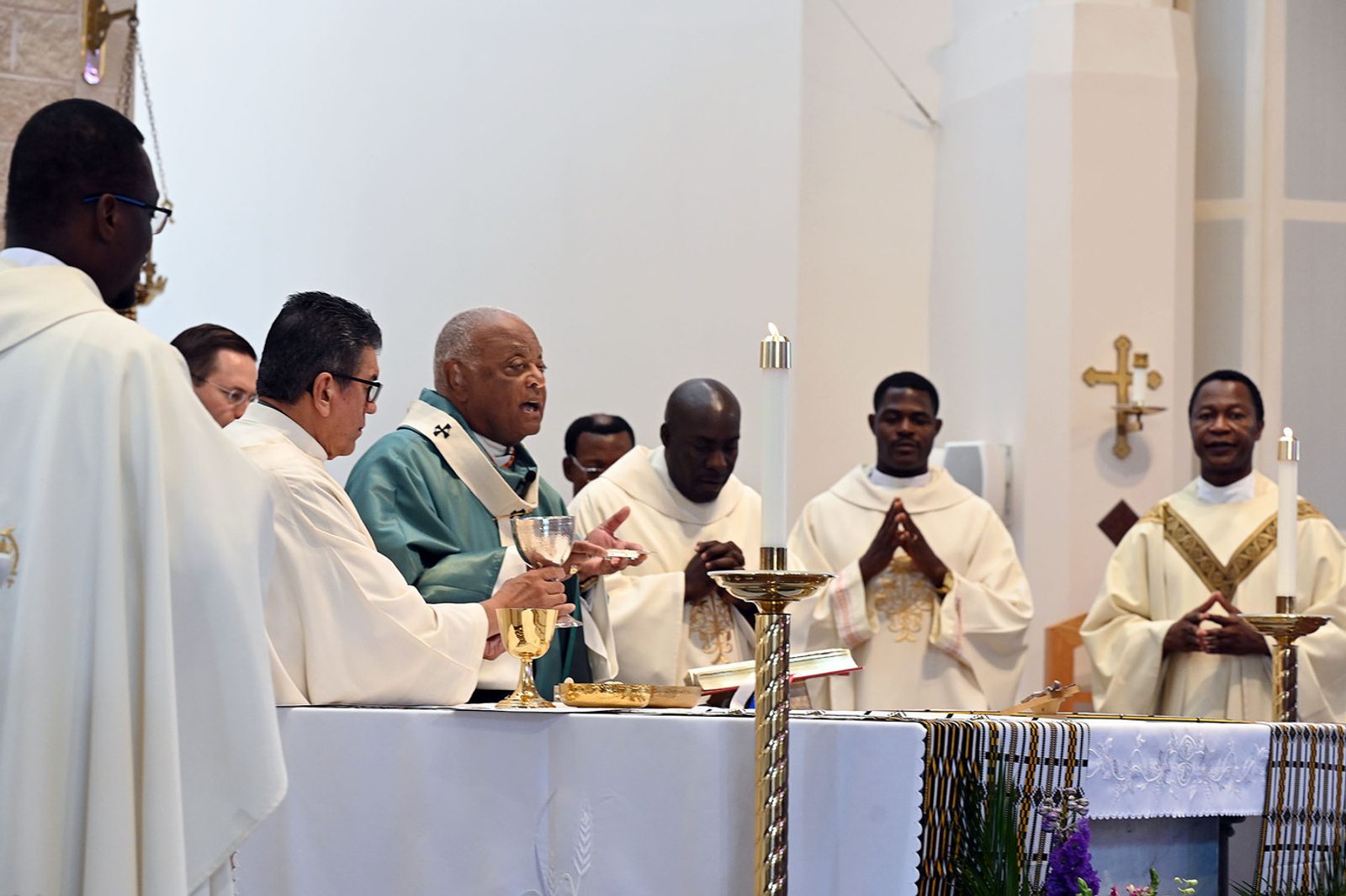Washington Cardinal Wilton Gregory celebrates the Aug. 20 Africa Day Mass at Mother Seton Church in Germantown, joined by priests with roots in the African continent. (Catholic Standard photo by Leslie Kossoff)