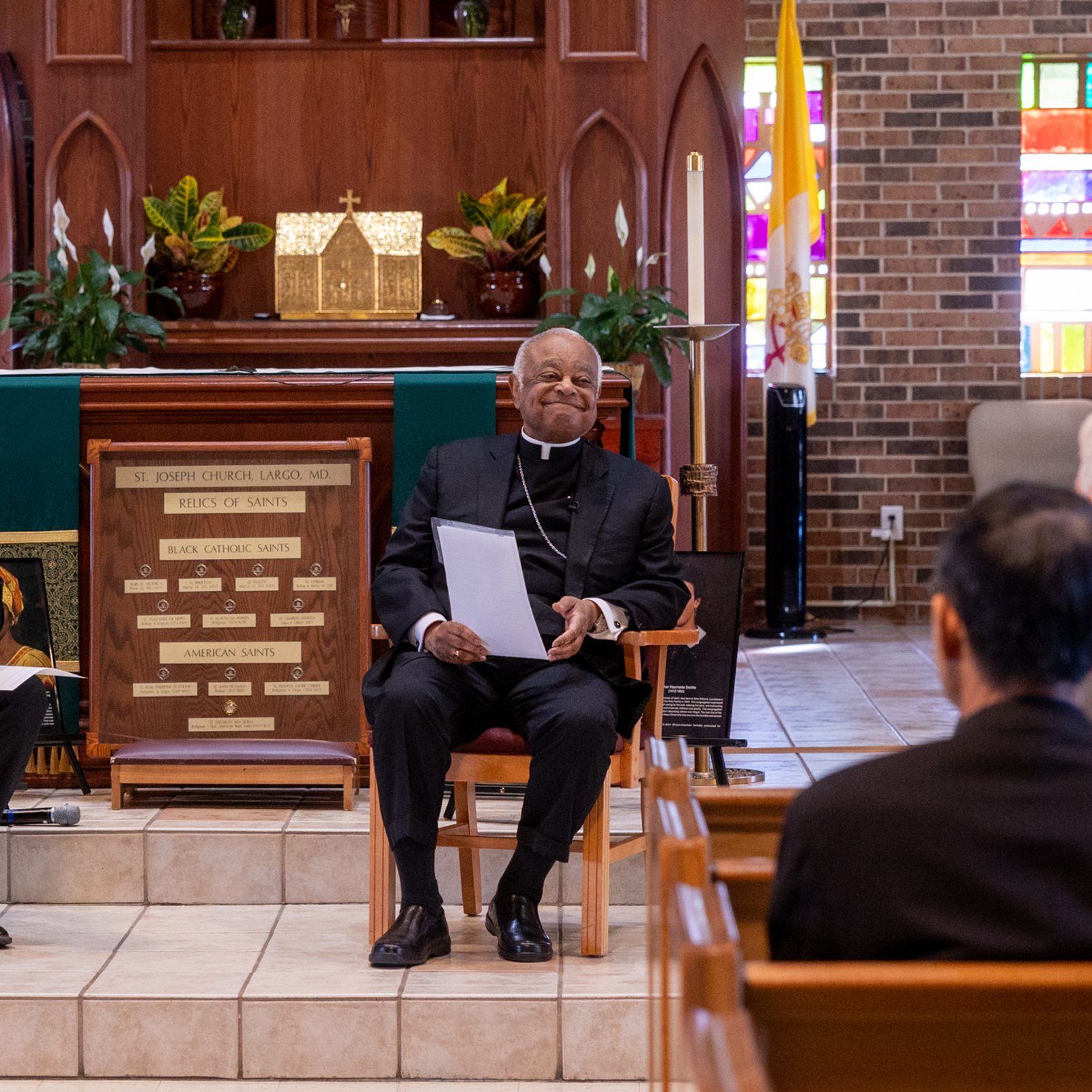 After Washington Cardinal Wilton Gregory celebrated a Mass to open The Roman Catholic Archdiocese of Washington’s Annual Convocation for Permanent Deacons and Wives held at St. Joseph Church in Largo, Maryland, on Nov. 9, 2024, the cardinal at right participated in a dialogue on the recent Synod of Bishops in Rome, joined at left by Deacon Steven Nash of St. Joseph’s Parish. (Catholic Standard photo by Mihoko Owada)