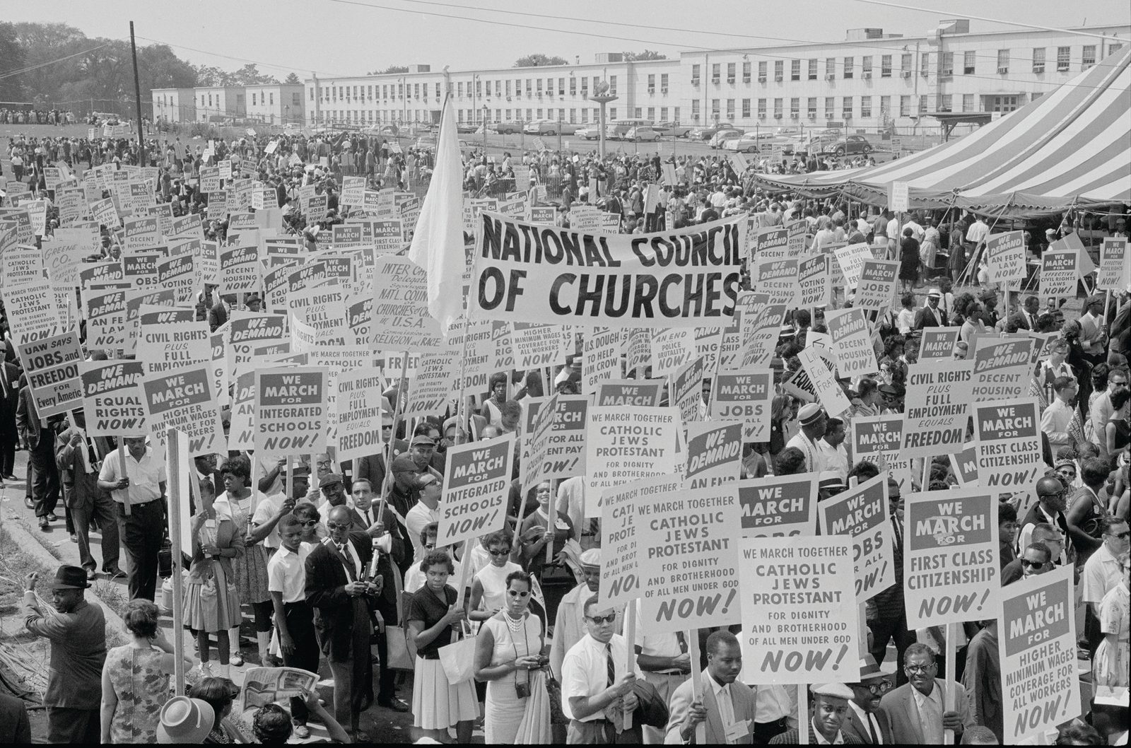 Above and below, marchers carry signs during the March on Washington for Jobs and Freedom Aug. 28, 1963. The march speakers included the Rev. Dr. Martin Luther King Jr., who delivered his now famous "I Have a Dream" speech, Archbishop Patrick O'Boyle of Washington, and several other religious leaders. (OSV News photos/courtesy Library of Congress)