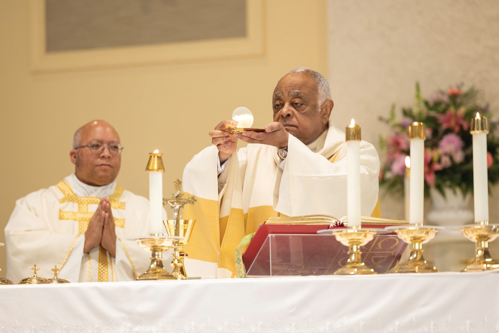 Washington Cardinal Wilton Gregory celebrates a Catholic Schools Week Mass on Jan. 28, 2025 at St. Peter’s Church in Waldorf for students in Charles County Catholic schools. The concelebrants at the Mass included, at left, Father Scott Woods, the pastor of Sacred Heart Parish in La Plata and the administrator of Archbishop Neale School there. (Catholic Standard photo by Mihoko Owada)