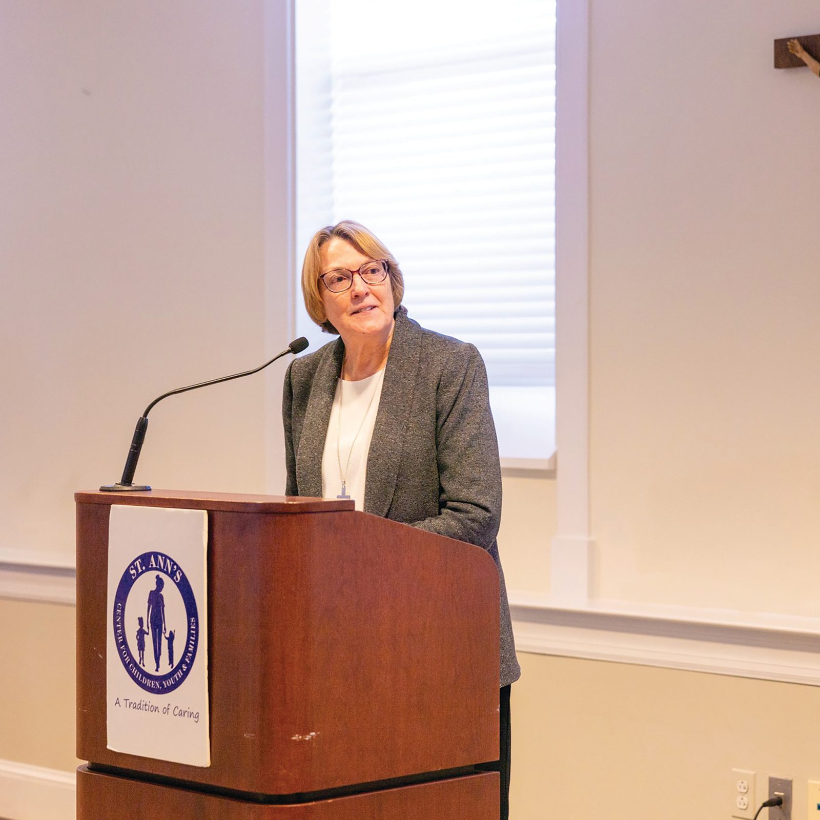 Sister Nancy Downing thanks staff and supporters of St. Ann’s Center at the reception following her Welcome Mass at the Archdiocese of Washington’s Pastoral Center in March 2024. “Thank you for all you do to lift up young women and children who come to us every day looking for our help and support,” Sister Nancy said. (Catholic Standard photo by Mihoko Owada)