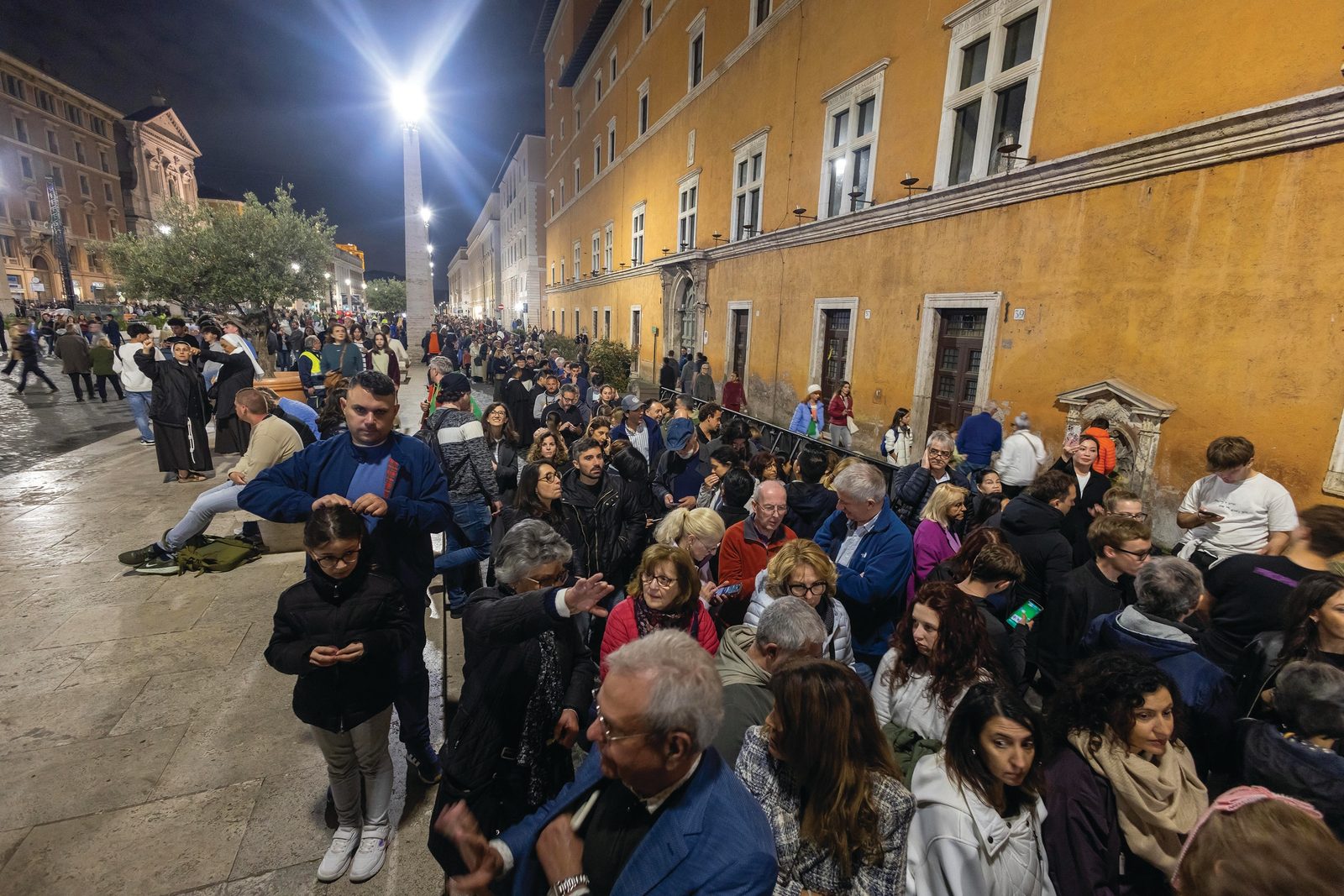 Above and below, People stand in line outside the Vatican to pay their respects to Pope Francis, lying in state in St. Peter’s Basilica at the Vatican April 23, 2025. Public viewing was to continue until April 25, the night before the late pope’s funeral. (CNS photos/Pablo Esparza)