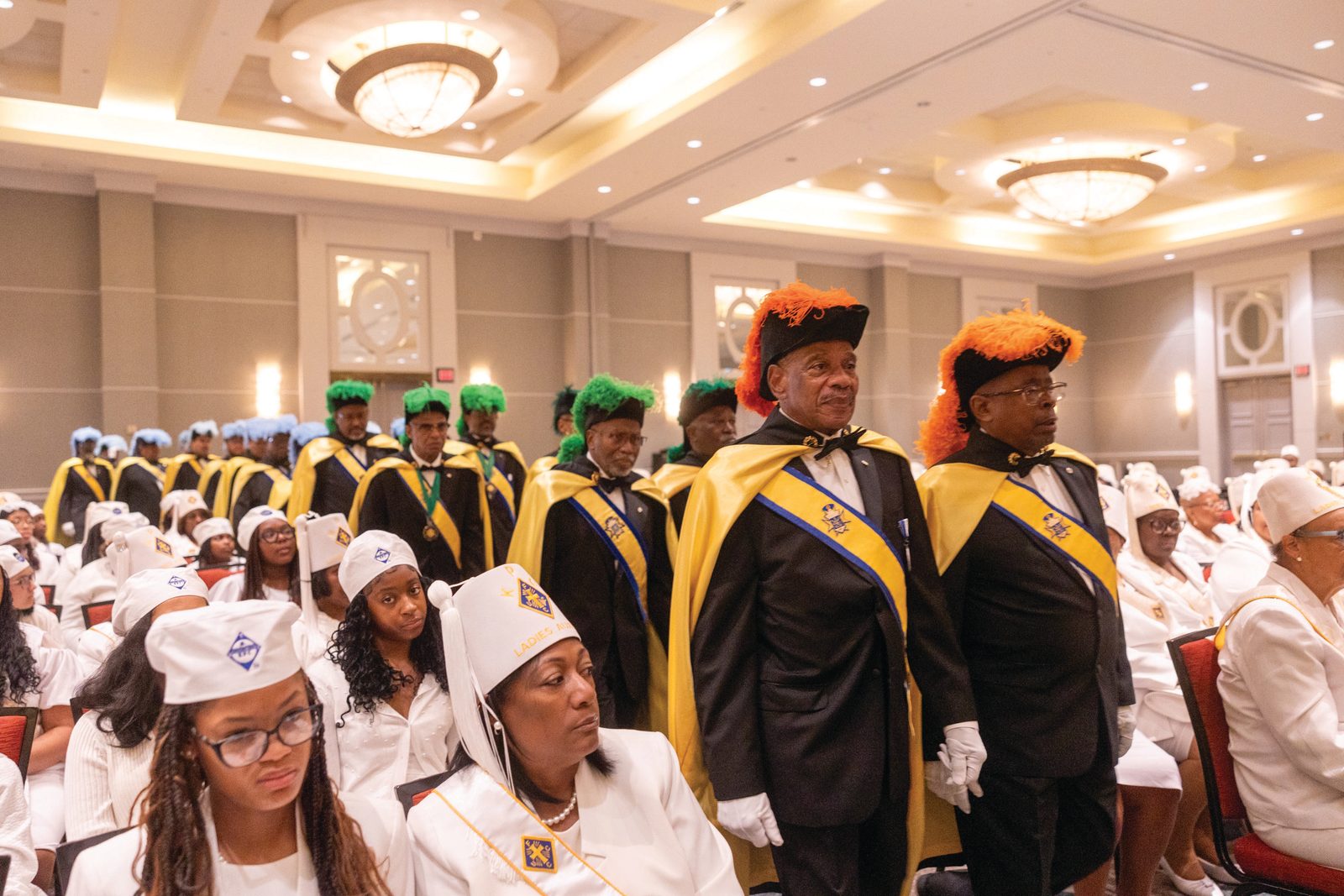 Above, members of the Knights of Peter Claver process into a July 20 Mass celebrated by Archbishop Timothy Broglio, archbishop of the Archdiocese for the Military Services, USA, and president of the U.S. Conference of Catholic Bishops, to open the fraternal organization’s 109th annual Senior National Convention. Below, members of the Knights of Peter Claver’s Ladies Auxiliary participate in the Mass. (CSS photos by Mihoko Owada)