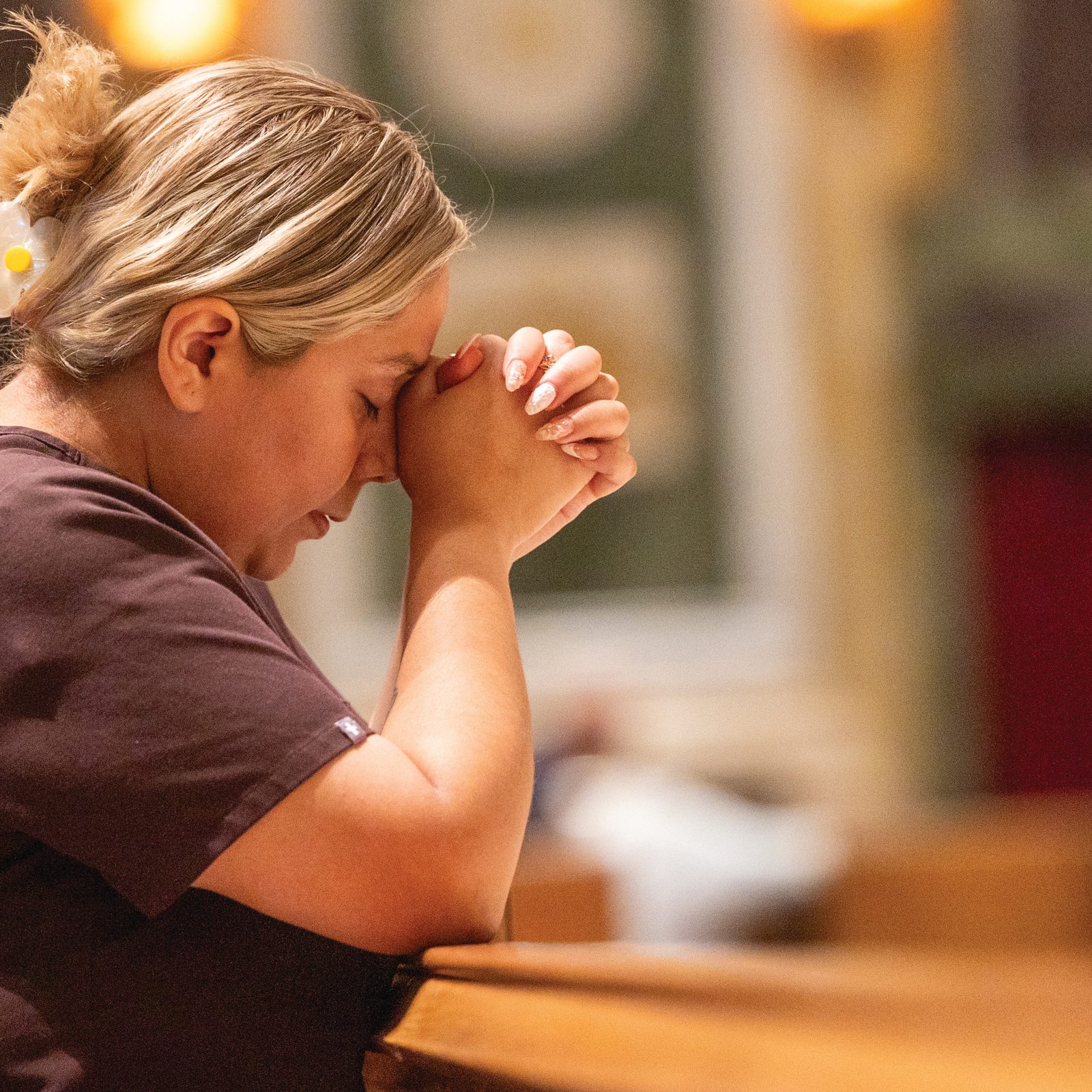 A woman prays during a special Mass for Peace on Aug. 22, 2025 at St. Matthew’s Cathedral in Washington that was celebrated in response to Pope Leo XIV’s call for Catholics to observe Aug. 22 as a day of prayer and fasting for peace, particularly in Ukraine and the Holy Land. (Catholic Standard photo by Mihoko Owada)