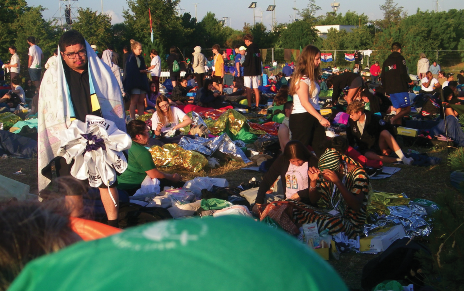 Pilgrims wake at sunrise after camping overnight at the University of Rome Tor Vergata during the Jubilee of Young People in Rome. (Photo courtesy of CYO pilgrim Tiffany Offor, St. Joseph Parish, Largo, Maryland)
