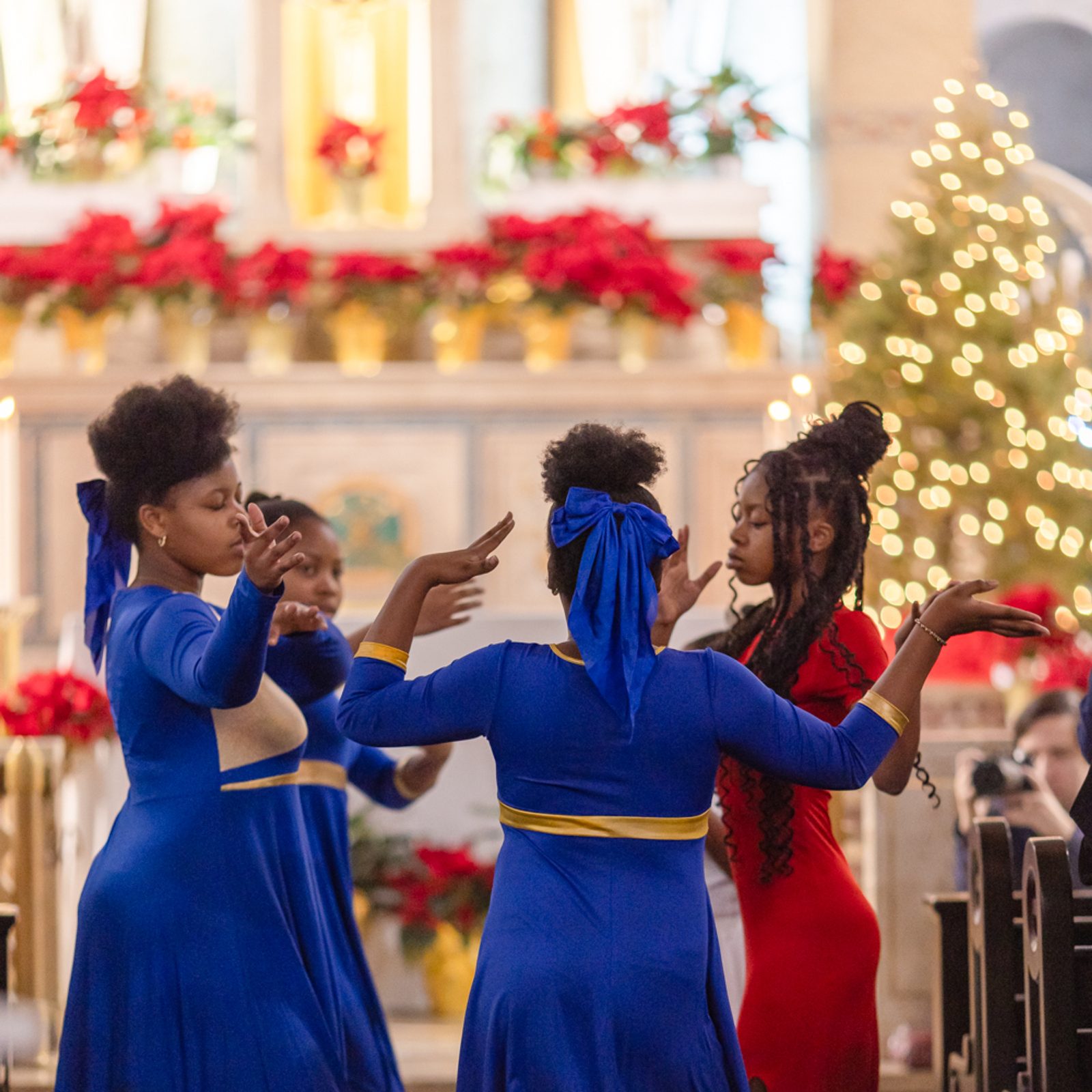 Young women perform a liturgical dance during a Mass on Jan. 1, 2025 at the Shrine of the Sacred Heart in Washington, D.C., that marked the 221st anniversary of Independence Day for Haiti and the Solemnity of the Blessed Virgin Mary, Mother of God. Washington Cardinal Wilton Gregory was the main celebrant at the Mass. (Catholic Standard photo by Rachel Lincoln)