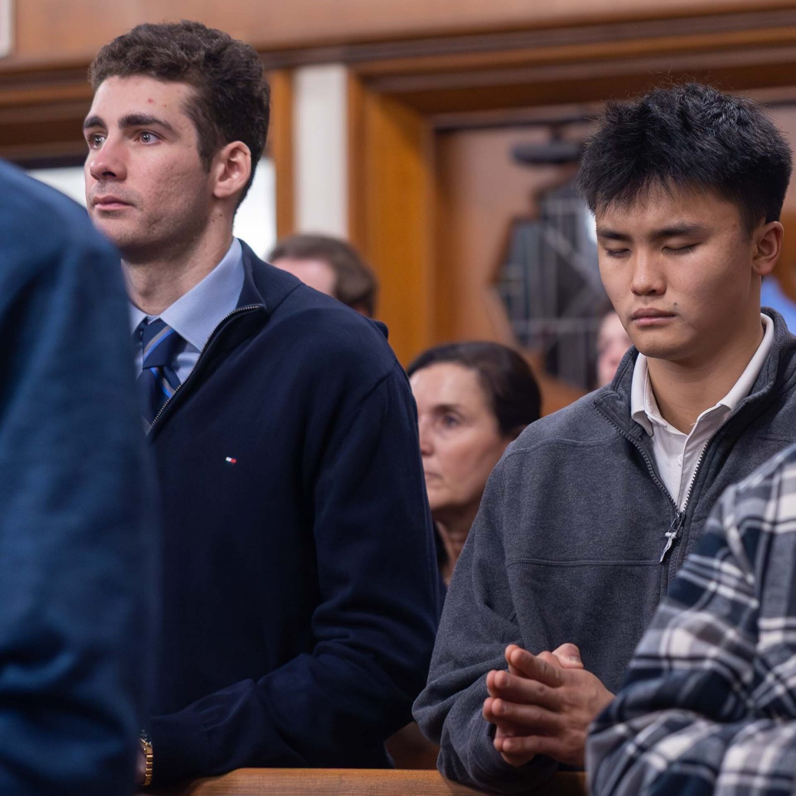People pray during a Feb. 11 Mass at Our Lady of Lourdes Church in Bethesda that marked the parish’s 100th anniversary. (Catholic Standard photo by Mihoko Owada)