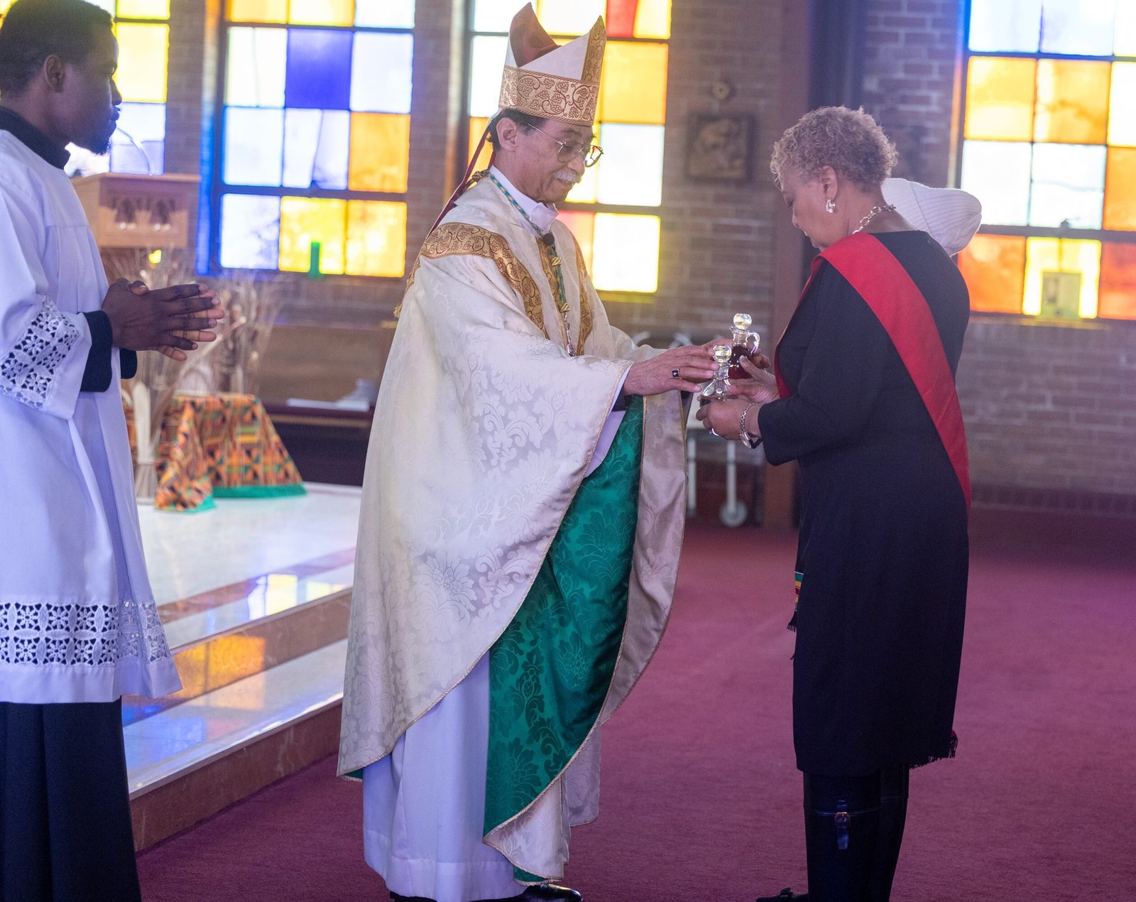 Washington Auxiliary Bishop Roy Campbell Jr. receives offertory gifts during a Mass for Black History Month on Feb. 22, 2025 at the Church of the Incarnation in Washington, D.C. (Catholic Standard photos by Mihoko Owada)