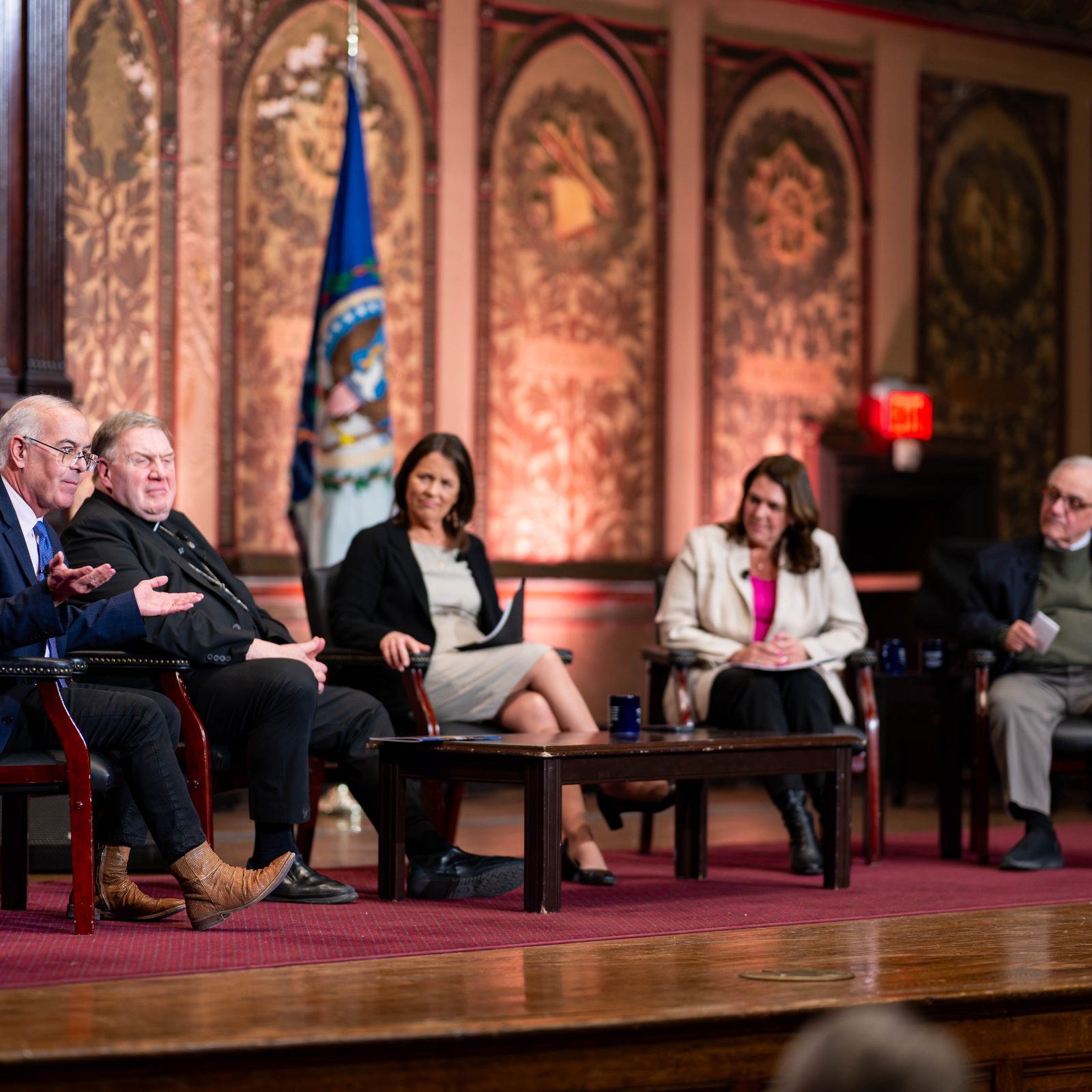 The Initiative on Catholic Social Thought and Public Life at Georgetown University held a dialogue on Jan. 21, 2026  to honor the initiative’s founder, John Carr, who retired at the end of 2025. The participants in the dialogue on “50 Years Connecting Catholic Social Thought and Public Life: Lessons from John Carr’s Leadership” included, from left to right, David Brooks, an author and New York Times columnist; Cardinal Joseph Tobin, a member of the Redemptorist religious order who serves as the archbishop of Newark, New Jersey; Kim Daniels, the initiative’s director who succeeded John Carr; Kerry Robinson, the president and CEO of Catholic Charities, USA; and E.J. Dionne, a professor at Georgetown University’s McCourt School of Public Policy and a contributing columnist for the New York Times. (Georgetown University photo/Phil Humnicky)