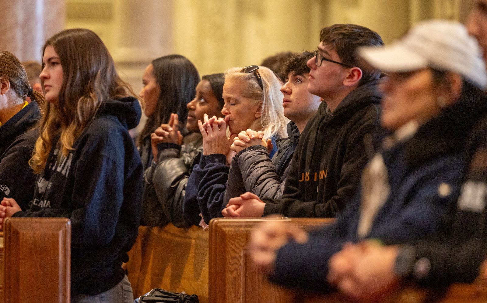 People pray during the Youth Mass for Life on Jan. 24, 2025 at the Cathedral of St. Matthew the Apostle in Washington, D.C. The annual Mass sponsored by The Roman Catholic Archdiocese of Washington preceded the March for Life in the nation’s capital. (Catholic Standard photos by Mihoko Owada)