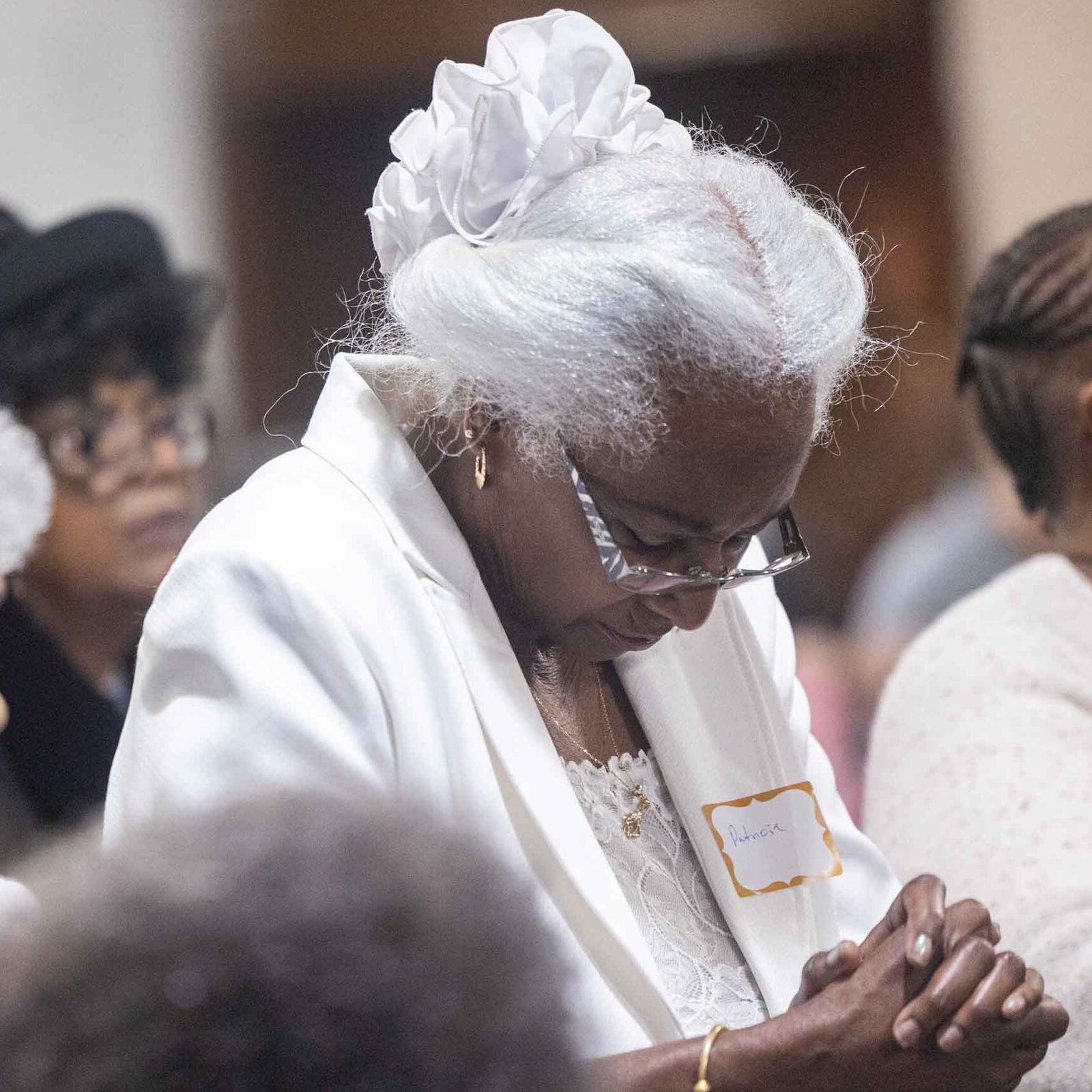 People pray during the 125th anniversary Mass for Nativity Parish in Washington on Feb. 22, 2026. (Catholic Standard photos by Mihoko Owada)