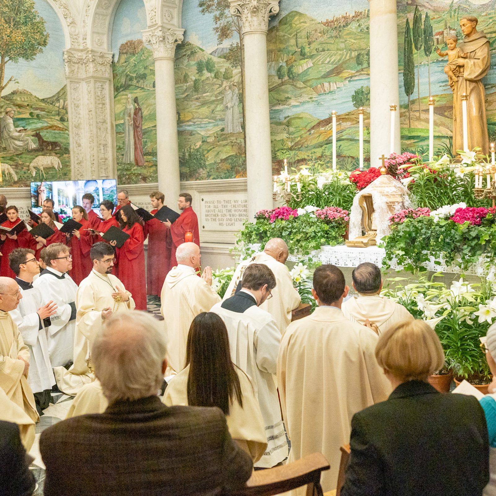 Following the Mass of the Lord’s Supper that he celebrated on Holy Thursday, March 28, at St. Matthew’s Cathedral in Washington, Cardinal Wilton Gregory joins people in praying before the Altar of Repose at the St. Anthony Chapel there. (Catholic Standard photo by Mihoko Owada)