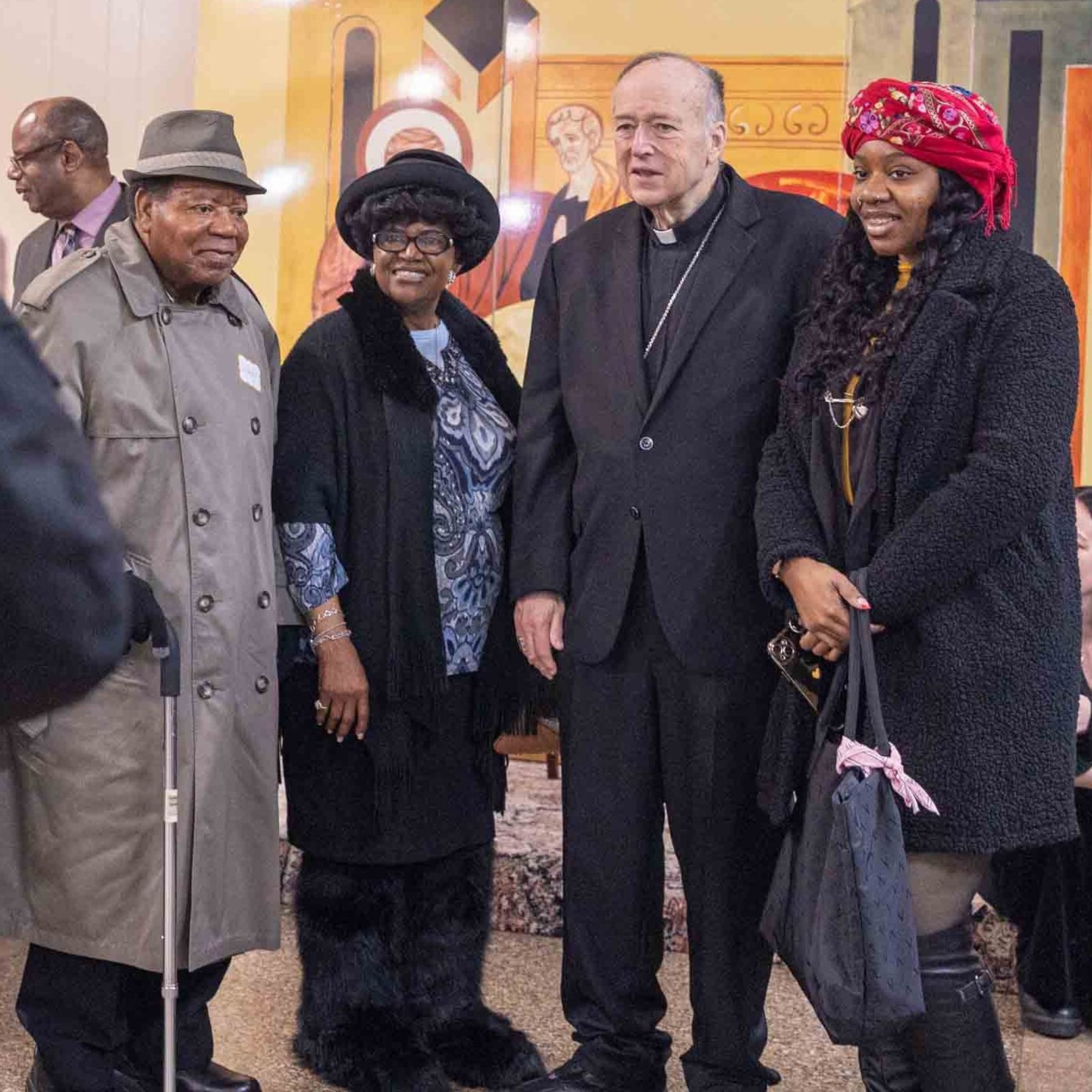 Cardinal Robert W. McElroy, the archbishop of Washington, stands with members of Nativity Parish in Washington, D.C., at a reception following a Mass on Feb. 22, 2026 marking the parish’s 125th anniversary. (Catholic Standard photo by Mihoko Owada)