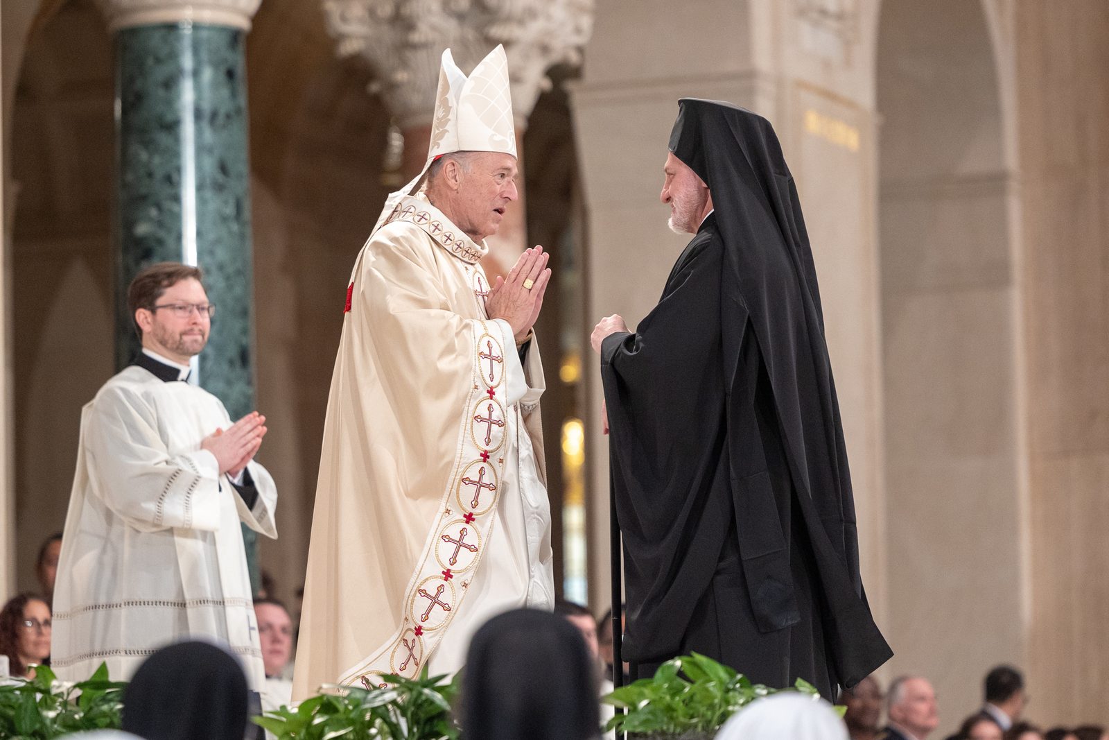 During his Solemn Mass of Installation as the new archbishop of Washington on March 11, 2025 at the Basilica of the National Shrine of the Immaculate Conception, Cardinal Robert McElroy was greeted by religious leaders of other faith communities. (Catholic Standard photo by Mihoko Owada)
