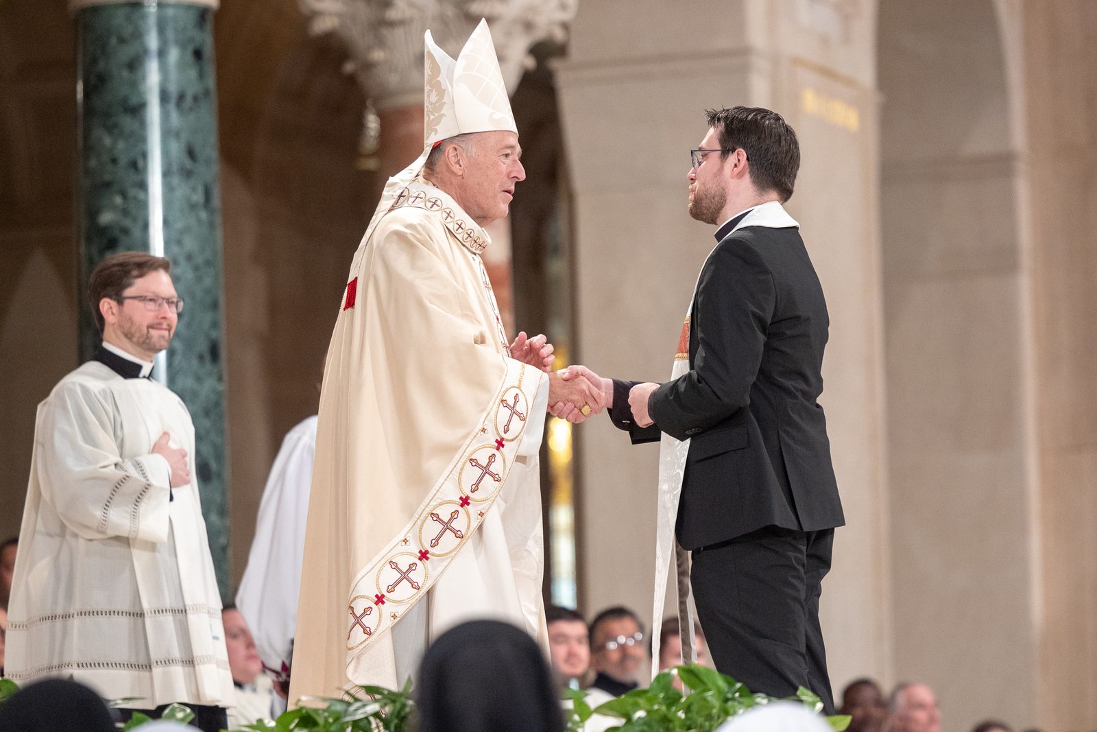 During his Solemn Mass of Installation as the new archbishop of Washington on March 11, 2025 at the Basilica of the National Shrine of the Immaculate Conception, Cardinal Robert McElroy was greeted by religious leaders of other faith communities. (Catholic Standard photo by Mihoko Owada)