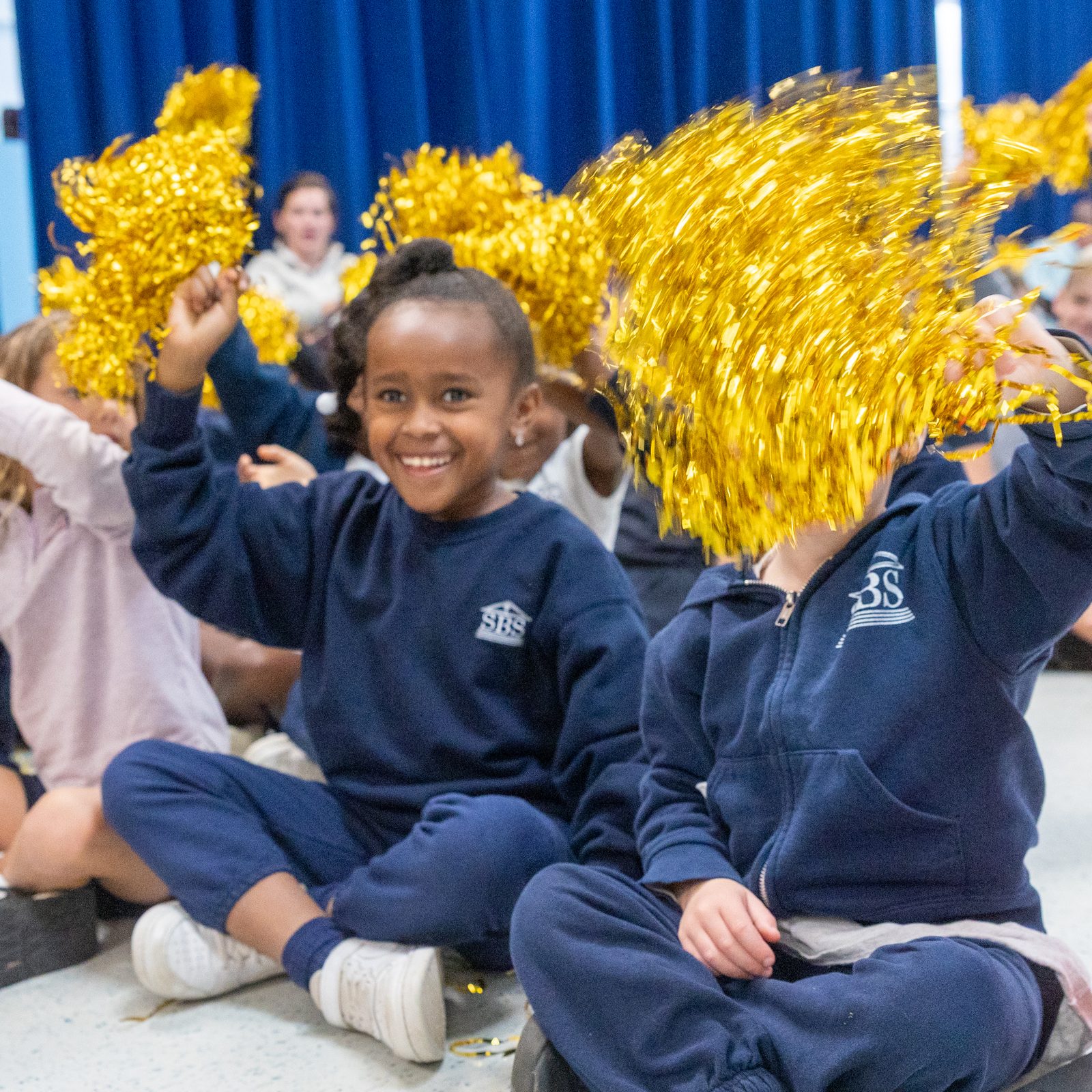 Students from St. Bernadette School in Silver Spring cheer for their principal, Ted Ewanciw, during a surprise ceremony on Oct. 10 in the school hall, where it was announced that he is the Roman Catholic Archdiocese of Washington’s 2025-2026 Distinguished Principal of the Year. (Catholic Standard photo by Mihoko Owada)