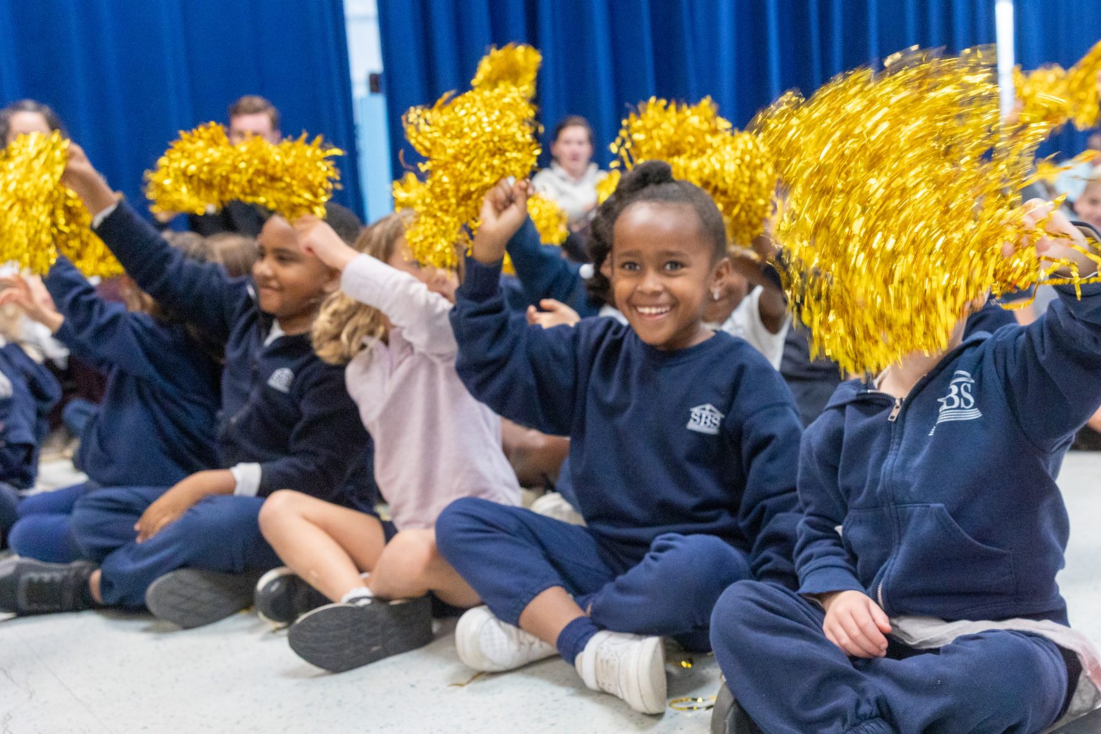 Students from St. Bernadette School in Silver Spring cheer for their principal, Ted Ewanciw, during a surprise ceremony on Oct. 10 in the school hall, where it was announced that he is the Roman Catholic Archdiocese of Washington’s 2025-2026 Distinguished Principal of the Year. (Catholic Standard photo by Mihoko Owada)