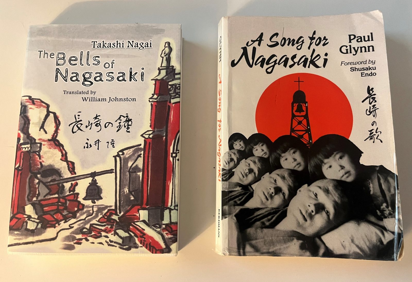 Takashi Nagai’s book, “The Bells of Nagasaki,” offers a first-hand account of the devastation of the atomic bomb that dropped on Nagasaki, Japan, on Aug. 9, 1945. The book “A Song for Nagasaki” by Marist Father Paul Glynn tells the story of the life and faith of Takashi Nagai. (Catholic Standard photo)