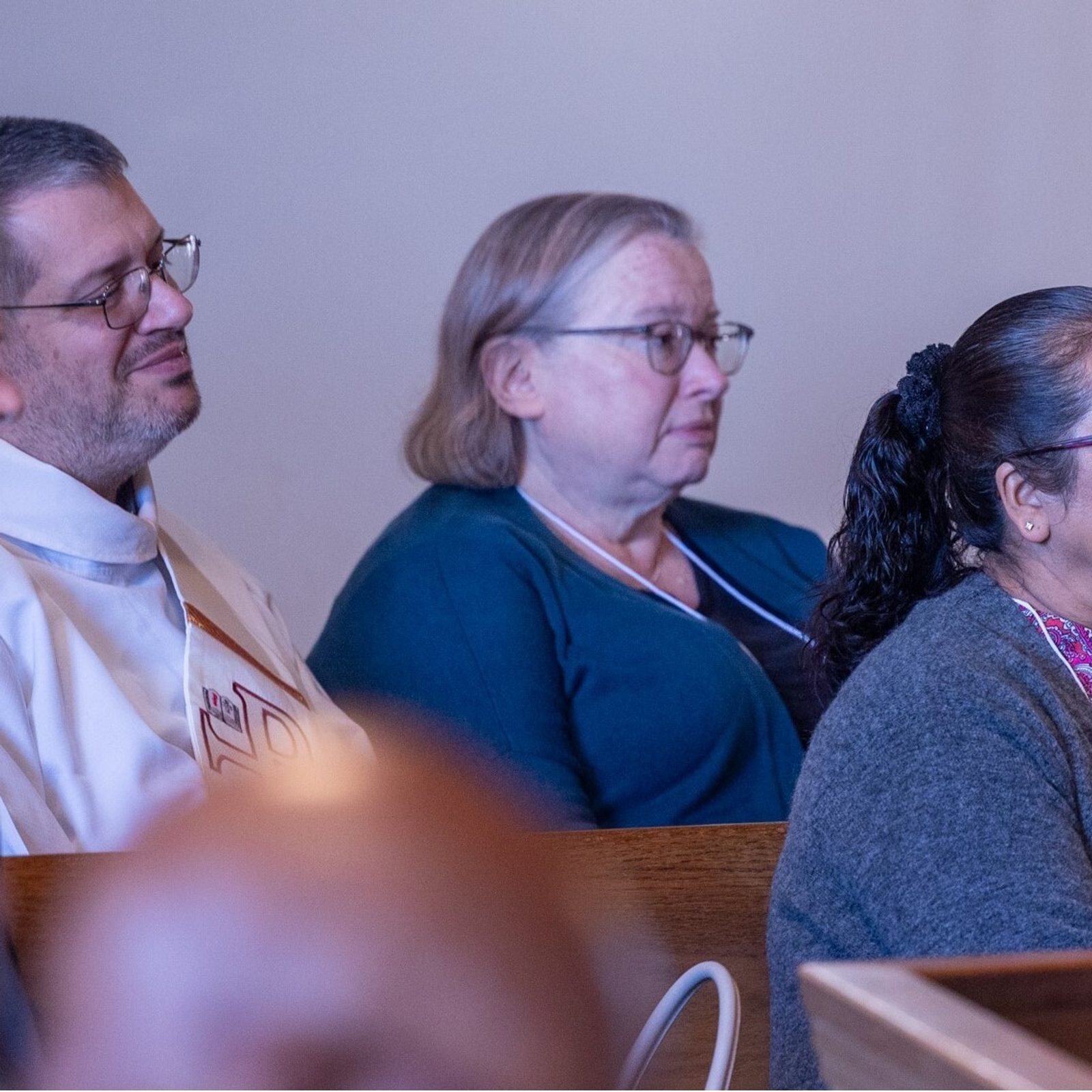 Deacon Charles Huber (at left) and his wife Jean Plummer and deacon candidate Edwin Hernandez (at left) and his wife Ruth Hernandez attend a Mass during The Roman Catholic Archdiocese of Washington’s Annual Convocation for Permanent Deacons and Wives held at St. Joseph Church in Largo, Maryland, on Nov. 9, 2024. Deacon Huber serves as the assistant director of permanent diaconate formation for the archdiocese. (Catholic Standard photo by Mihoko Owada)