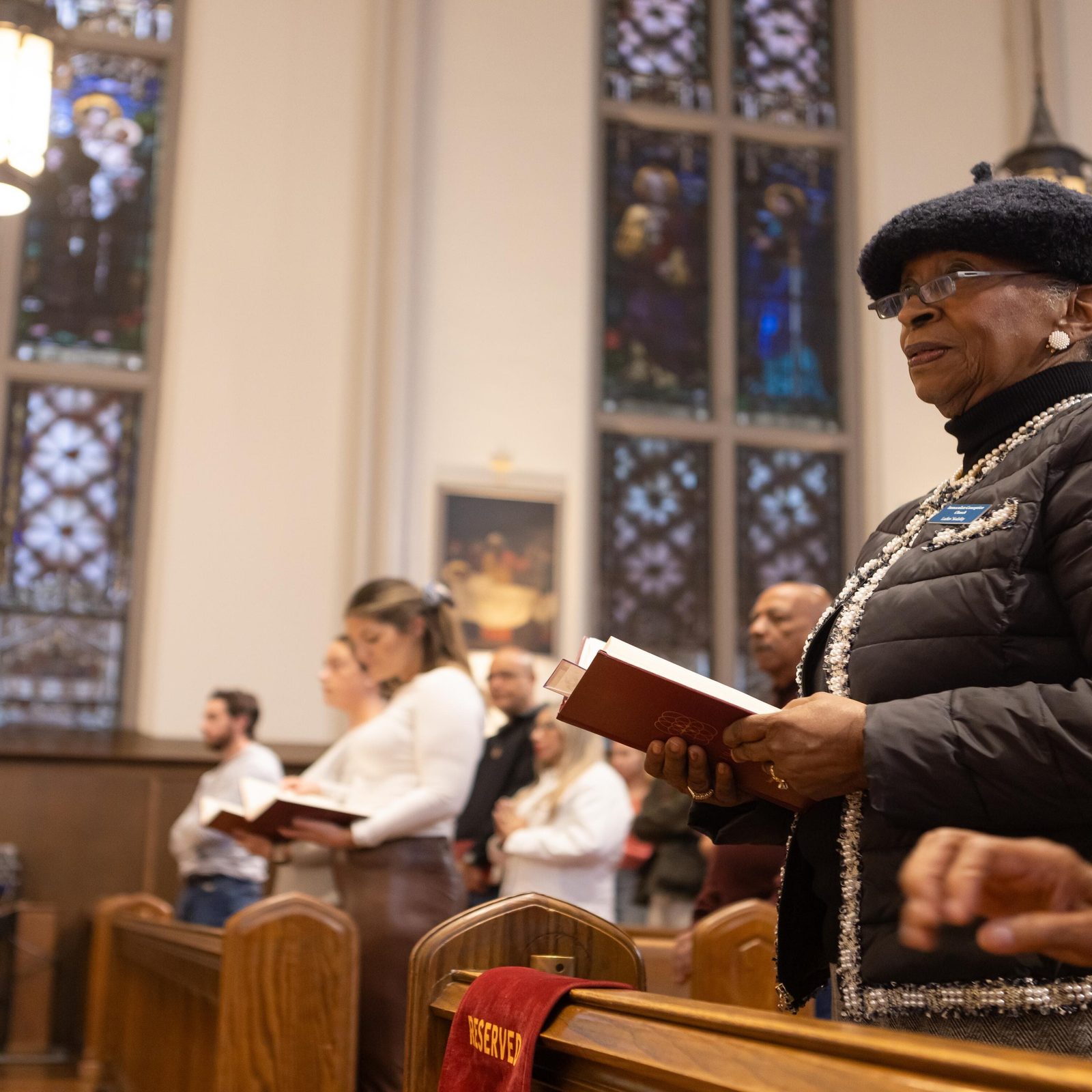 In the photos above and below, people pray during a Mass on Nov. 3, 2024 marking the 160th anniversary of Immaculate Conception Parish in Washington, D.C. (Catholic Standard photos by Rachel Lincoln)