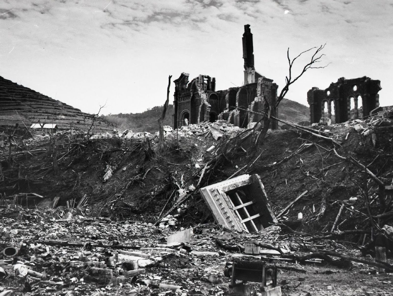 The ruins of the north and south walls of Urakami Cathedral in Nagasaki, Japan, are visible in this photograph taken after the United States dropped an atomic bomb over the city on Aug. 9, 1945. (Photo by H.J. Peterson/Nagasaki Atomic Bomb Museum)