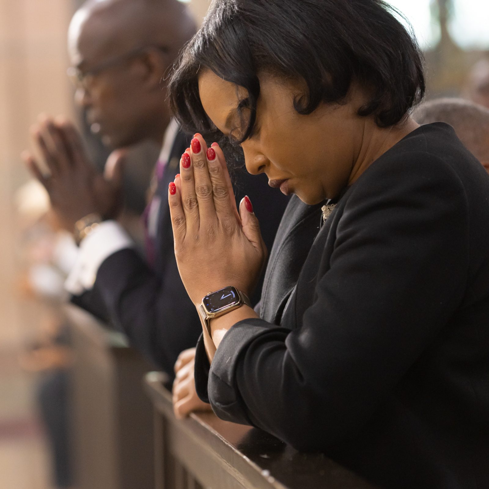 A woman prays during a Mass on Jan. 1, 2025 at the Shrine of the Sacred Heart in Washington, D.C., that marked the 221st anniversary of Independence Day for Haiti and the Solemnity of the Blessed Virgin Mary, Mother of God. Washington Cardinal Wilton Gregory was the main celebrant at the Mass. (Catholic Standard photos by Rachel Lincoln)
