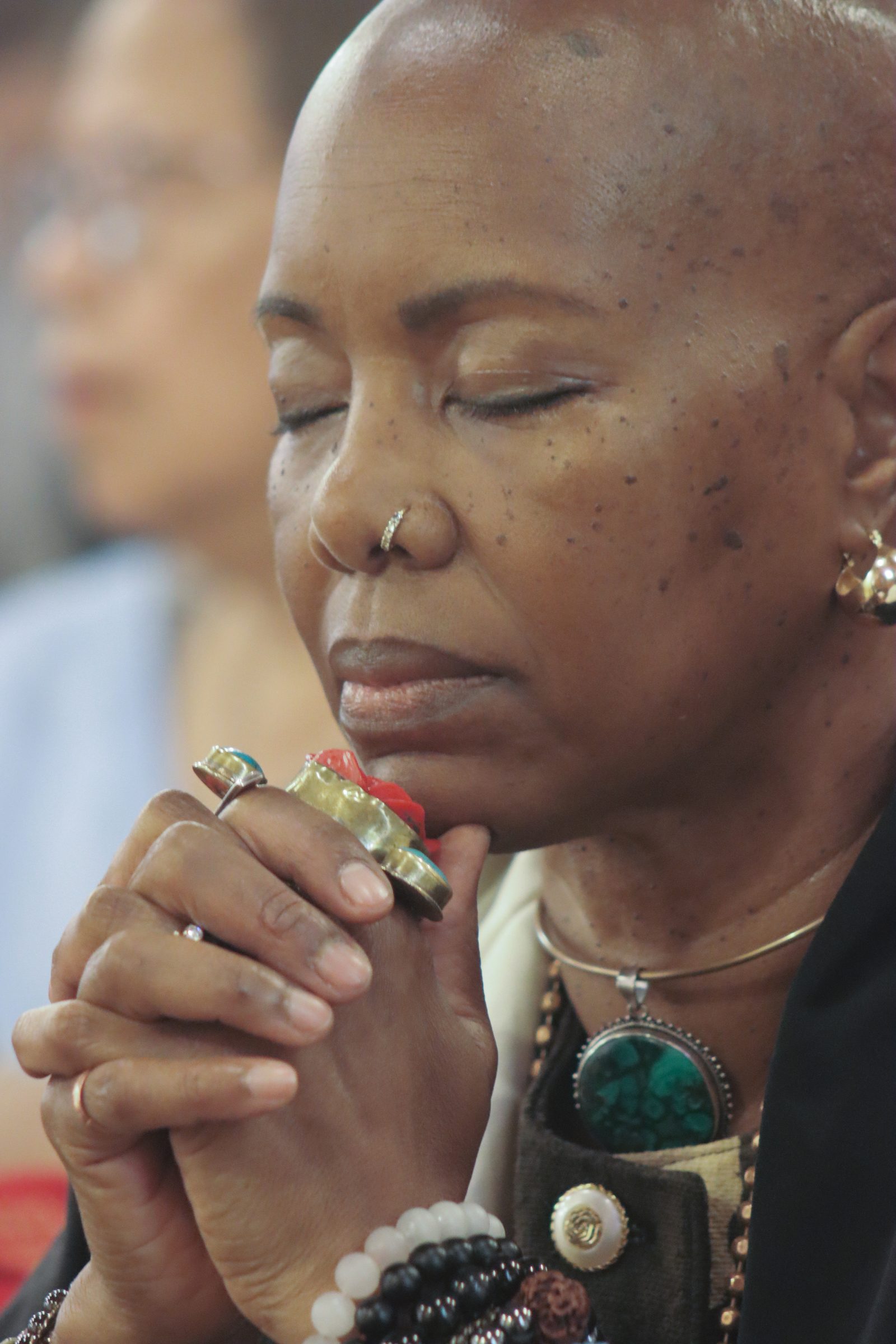 A woman prays during a 175th anniversary Mass for St. Ignatius Church in Oxon Hill, celebrated by Cardinal Wilton Gregory on July 28. (Catholic Standard photo by Javier Diaz)